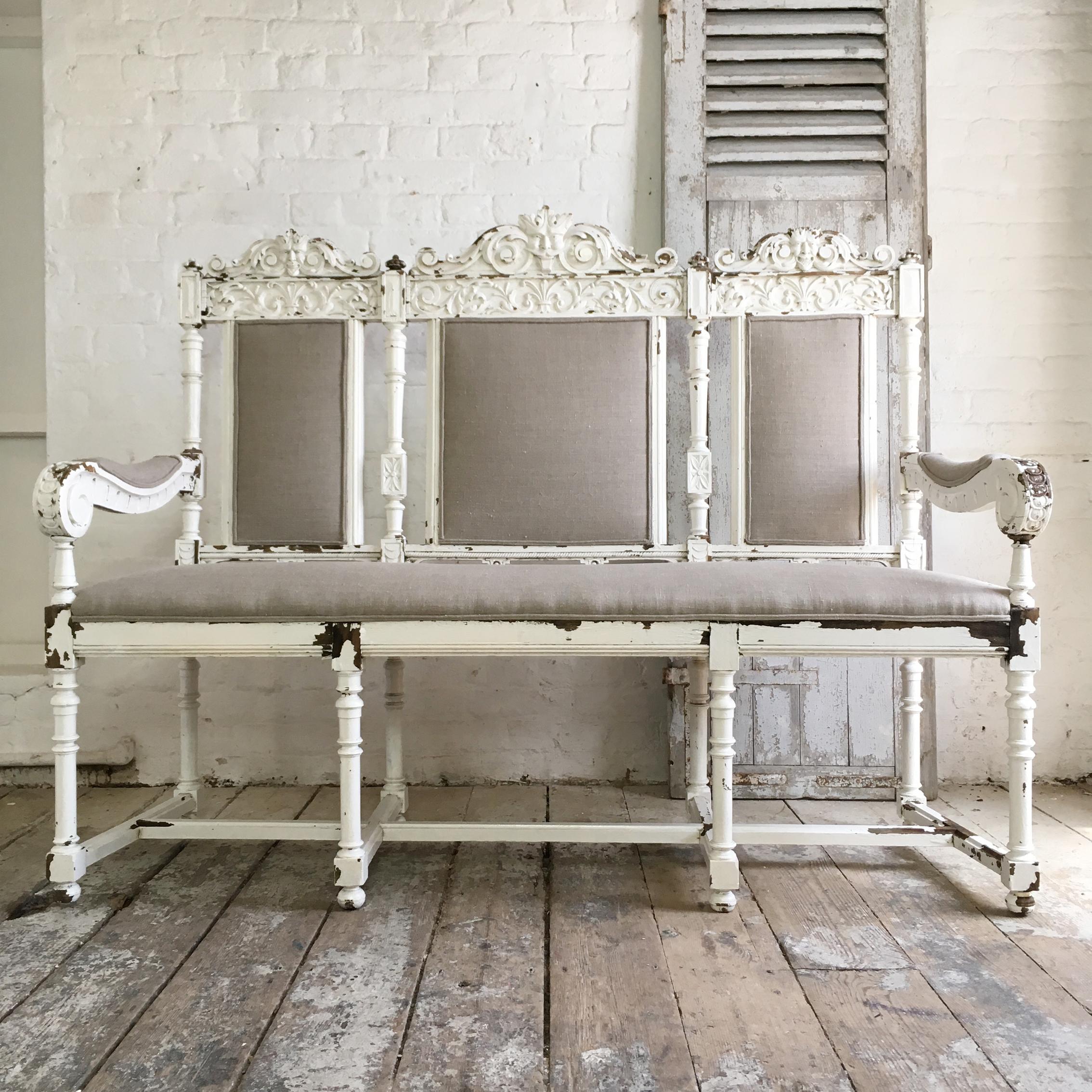 Late 18th century hand carved oak library or hall bench. Recently re-upholstered in natural linen
The bench was originally bespoke crafted for a country Chateau in Belgium in the late 1700s, the detailing on the bench would have mirrored the