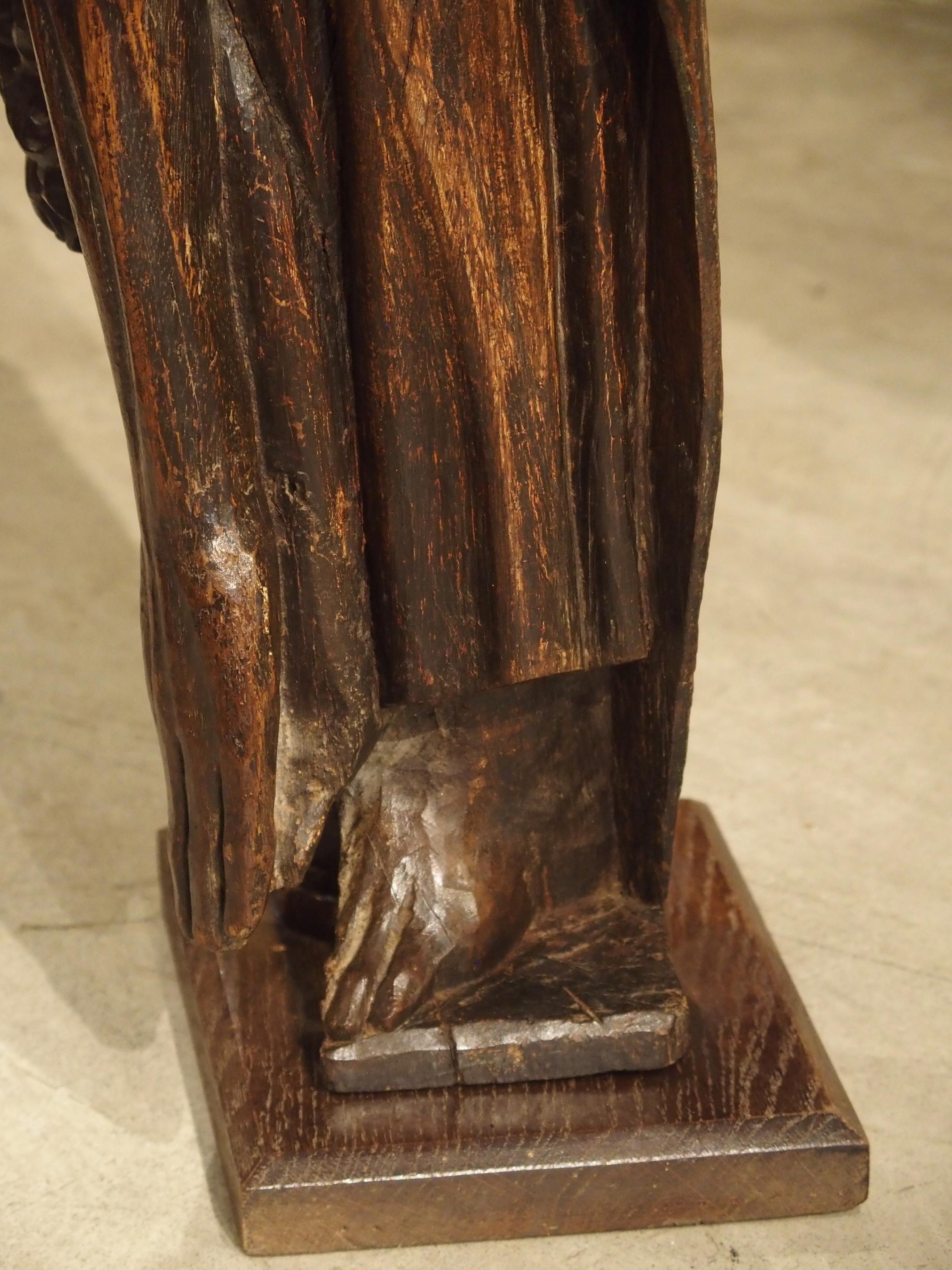 18th Century Carved Oak Statue Depicting St. Bartholomew For Sale 3