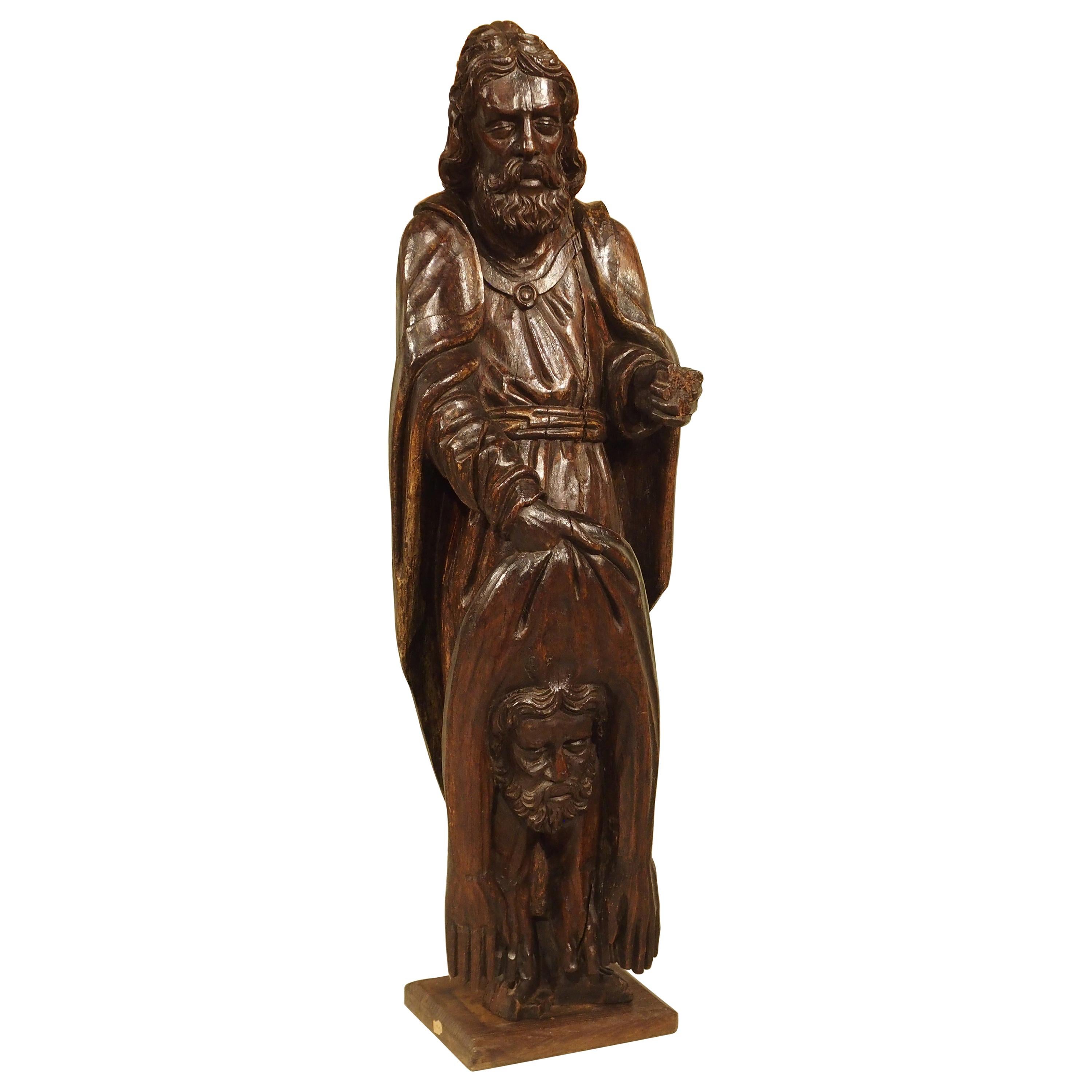 Statue en chêne sculpté du 18ème siècle représentant Saint Bartholomew en vente