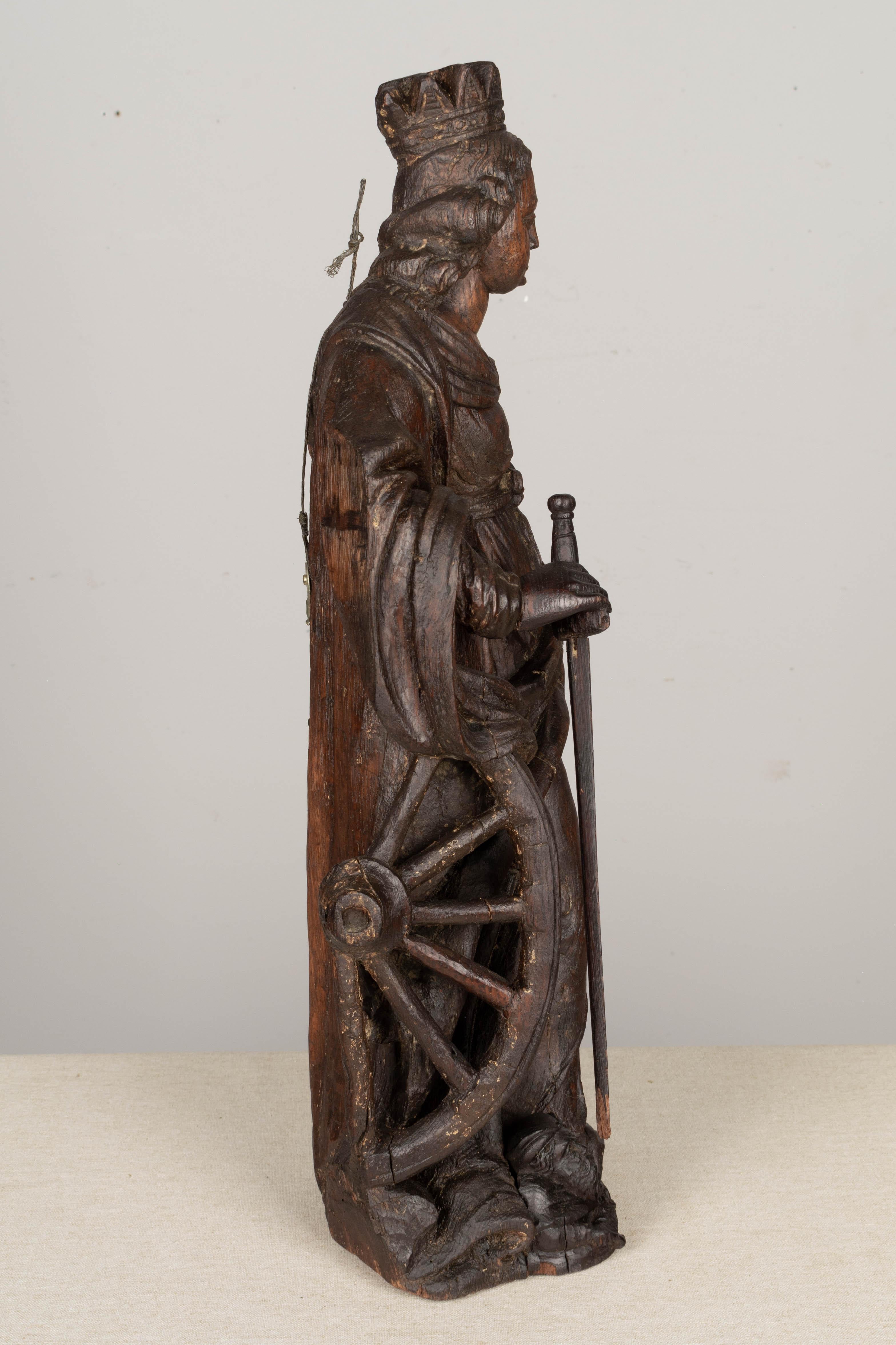 18th Century Carved Oak Statue of Saint Catherine of Alexandria In Good Condition For Sale In Winter Park, FL