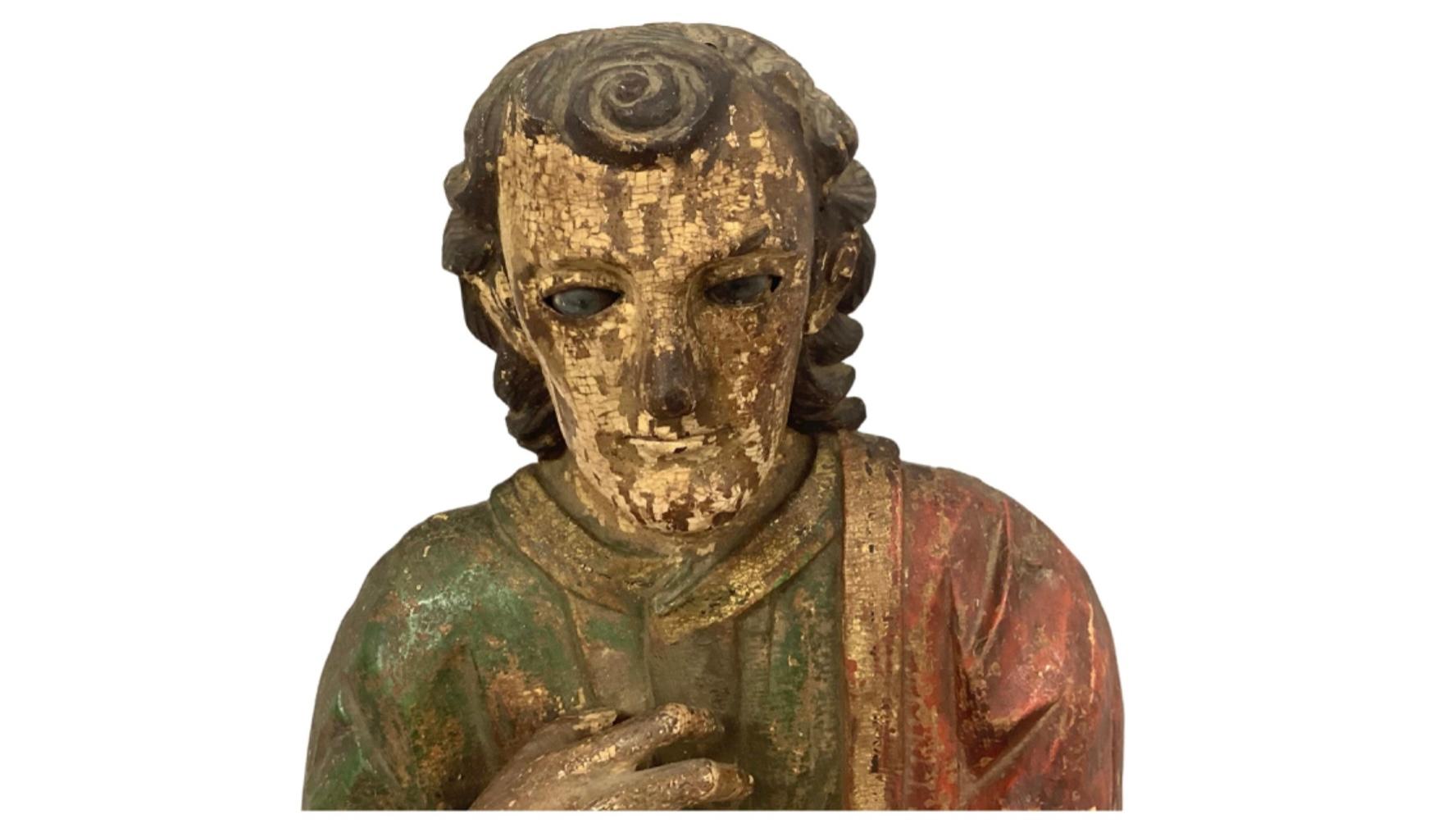 18th Century Carved & Polychrome Bust of a Saint with Glass Eye. Either Italian or Spanish. This piece retains a good portion of the original painted finish with age-appropriate wear and wonderful old patina.