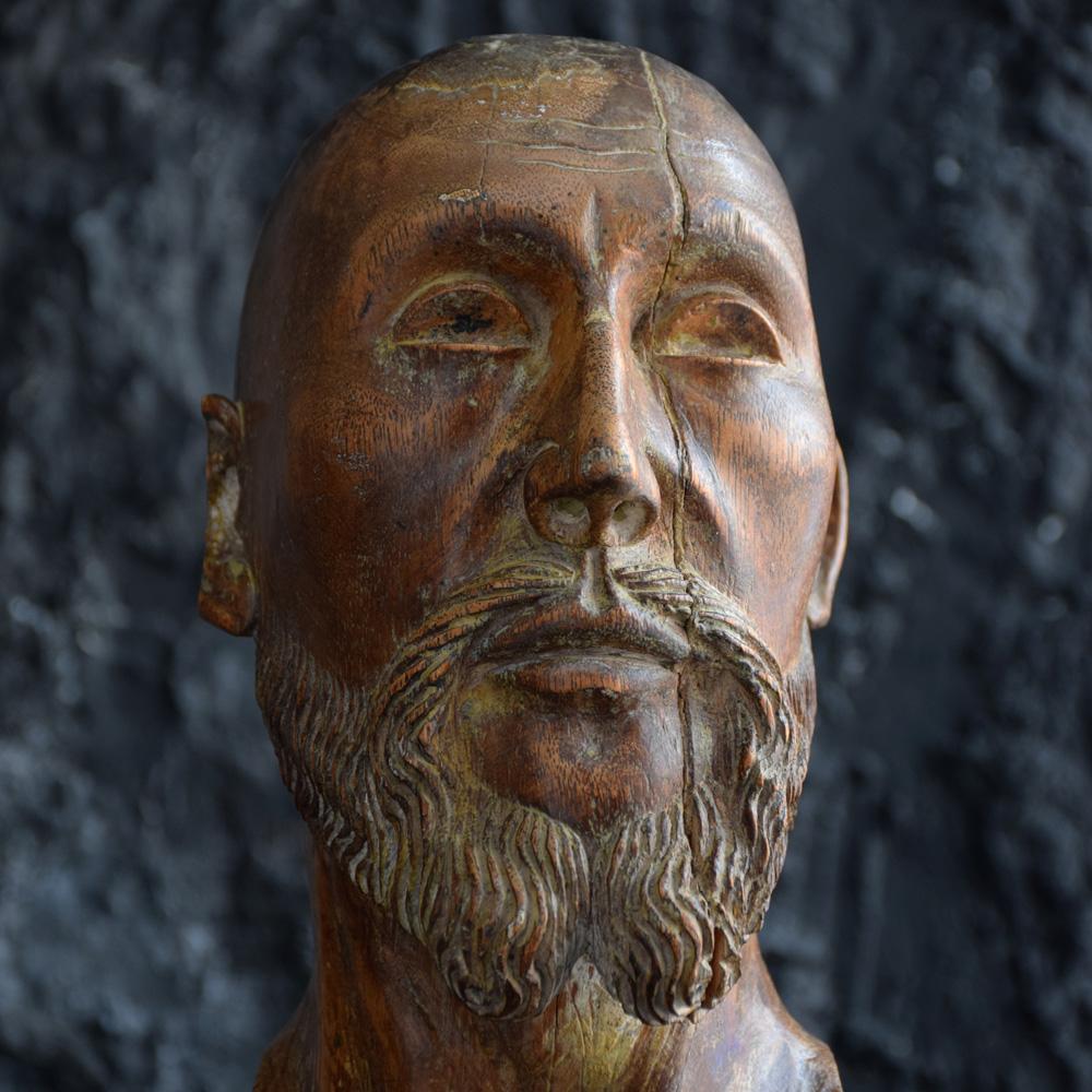 18th century carved wood Santos head
We are proud to offer a wonderful example of a fine 18th century solid carved wooden Santos or Apostles head. Of exceptional quality with detail to beard and neck, with head turned to one side bears trace of