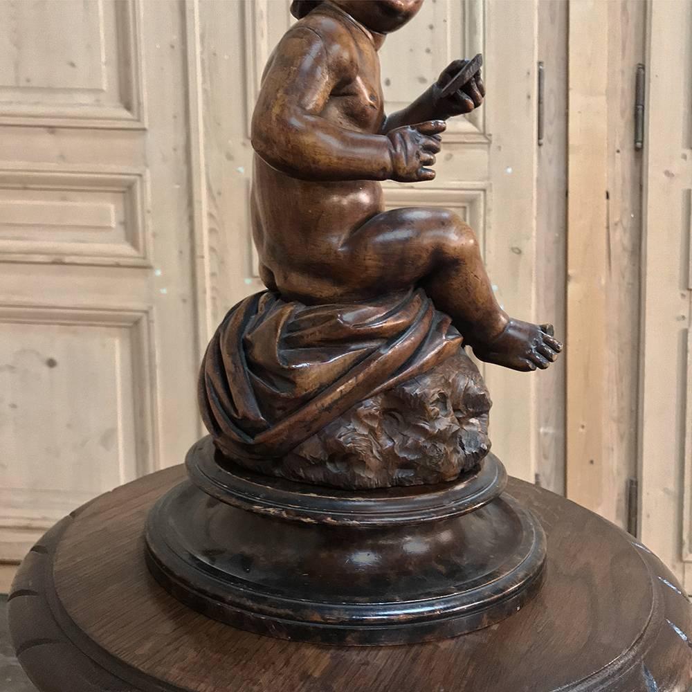 Walnut 18th Century Hand Carved Wood Statue of a Little Boy For Sale