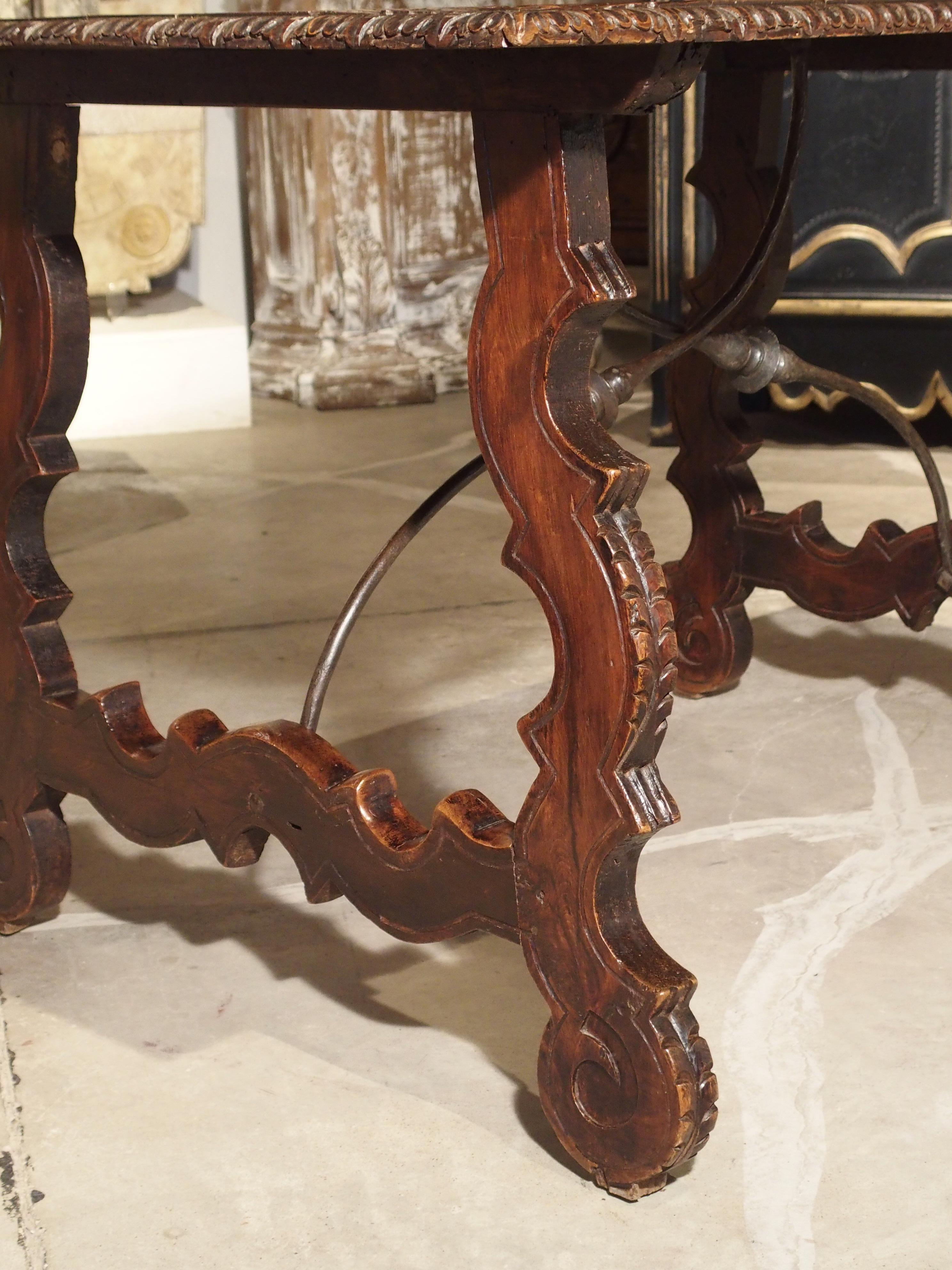 Hand-Carved 18th Century Catalan Table with Forged Iron Stretchers