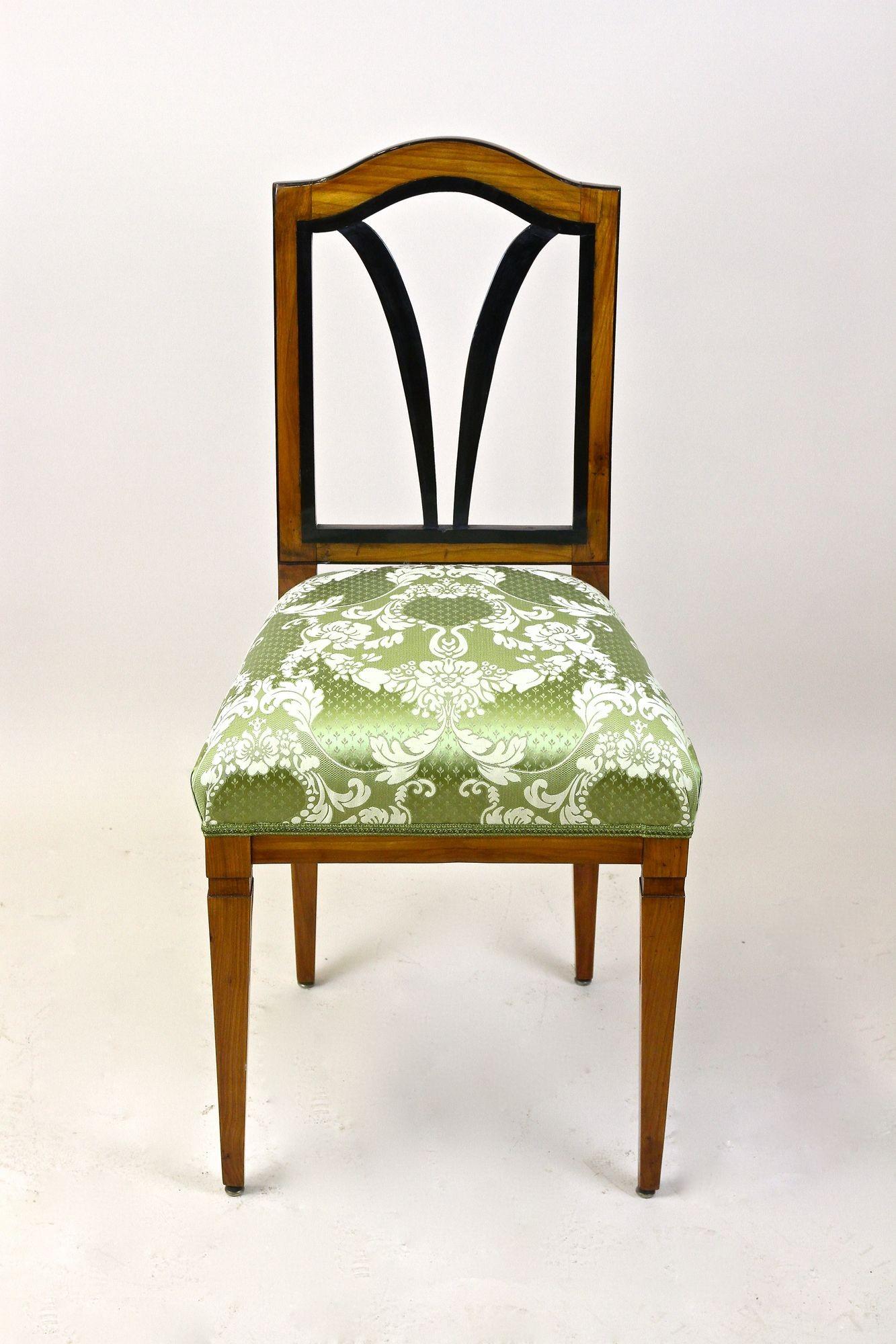 Unique 18th century cherrywood side chair from the period of emperor Joseph II. of Austria, the son of empress Maria Theresia, around 1790. Made of solid cherrywood, this decorative antique chair has been newly upholstered during the restoration