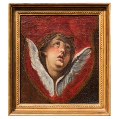 Peinture à l'huile sur toile du 18ème siècle représentant une tête de chérubin