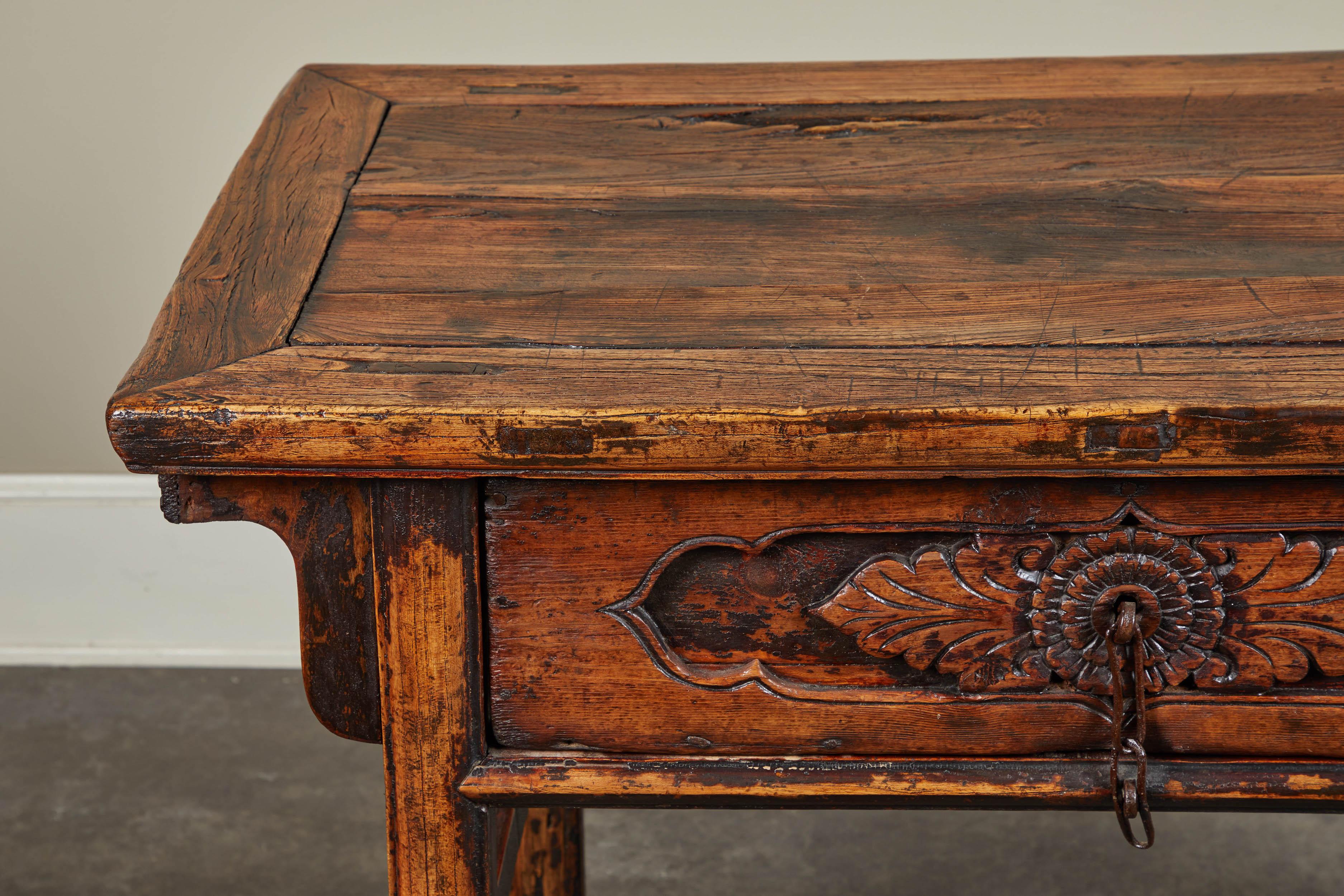 Ancient elm single drawer table from Shanghai, circa 18th century.