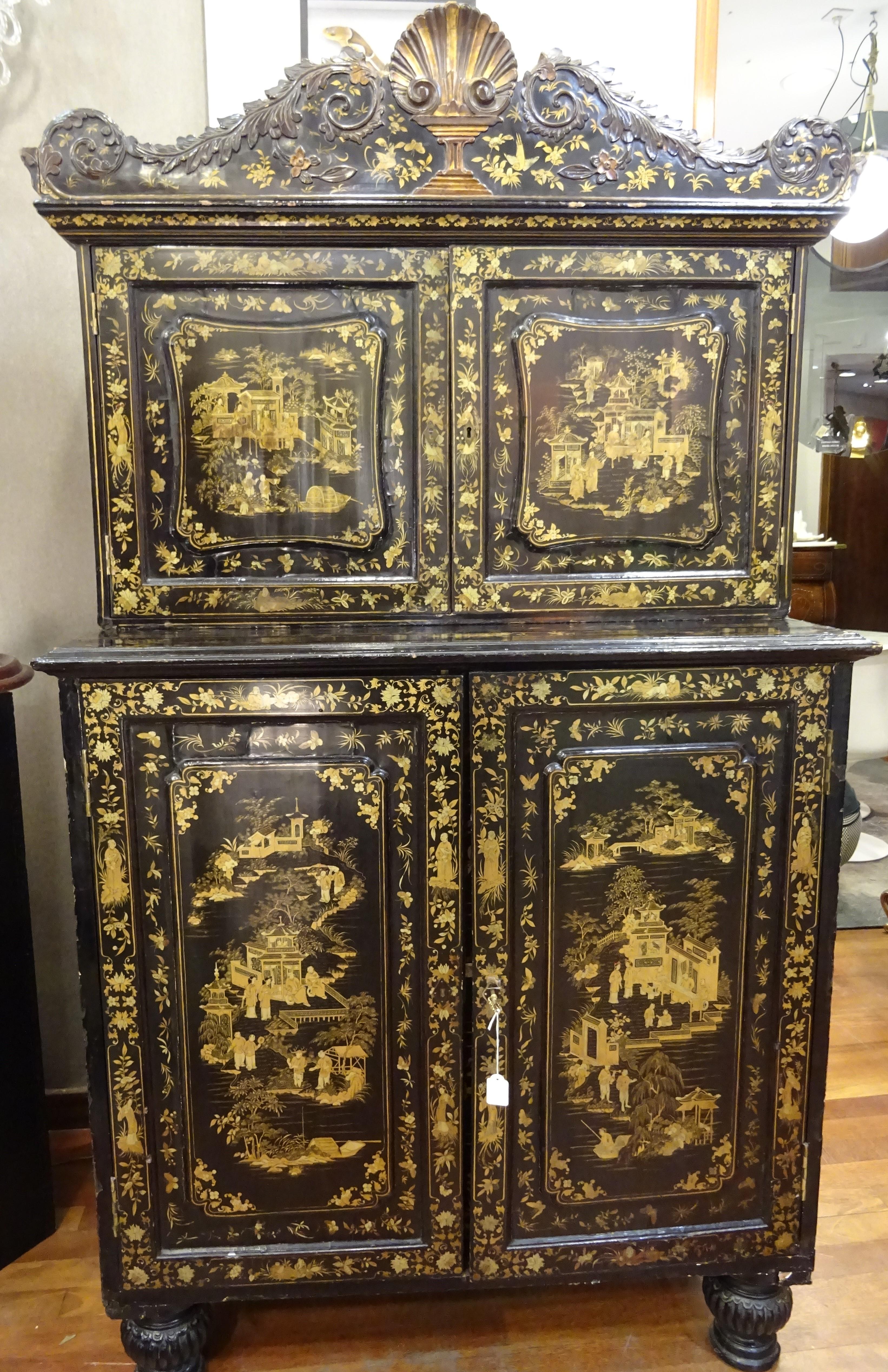One of a kind Chinese cabinet make for the exportation, from a English very important private collection.
It has two parts with doors, inside there are a lot of drawers with bone handle, also there is a little mirror on top of the cabinet. It's