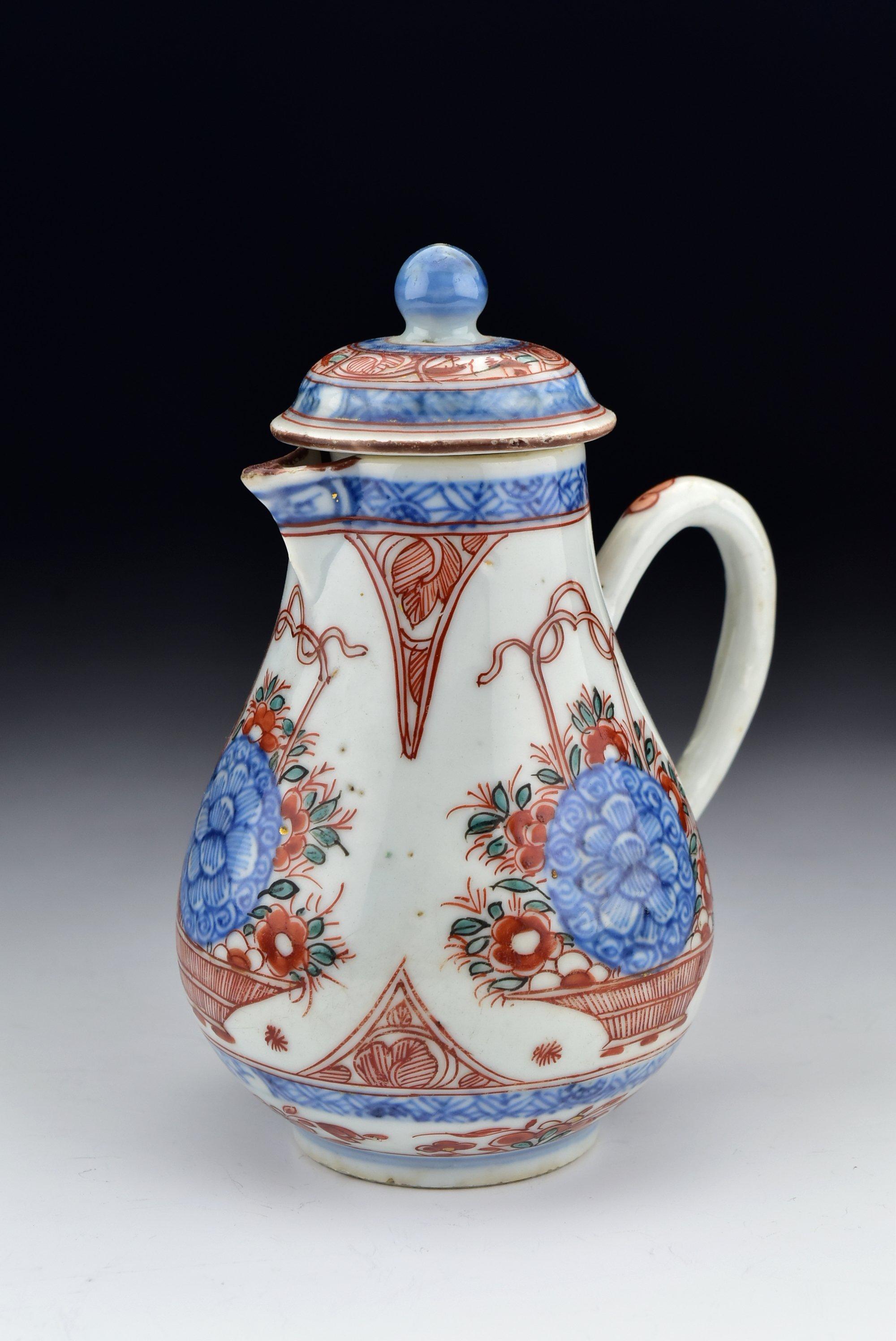 Description: Chinese export porcelain covered cream jug decorated in underglaze and above glaze designs including flowers and small views.

Age: circa 1735-1740

Size: Approximately 5 + 1/4 inches in overall height and 3 + 3/4 inches from the