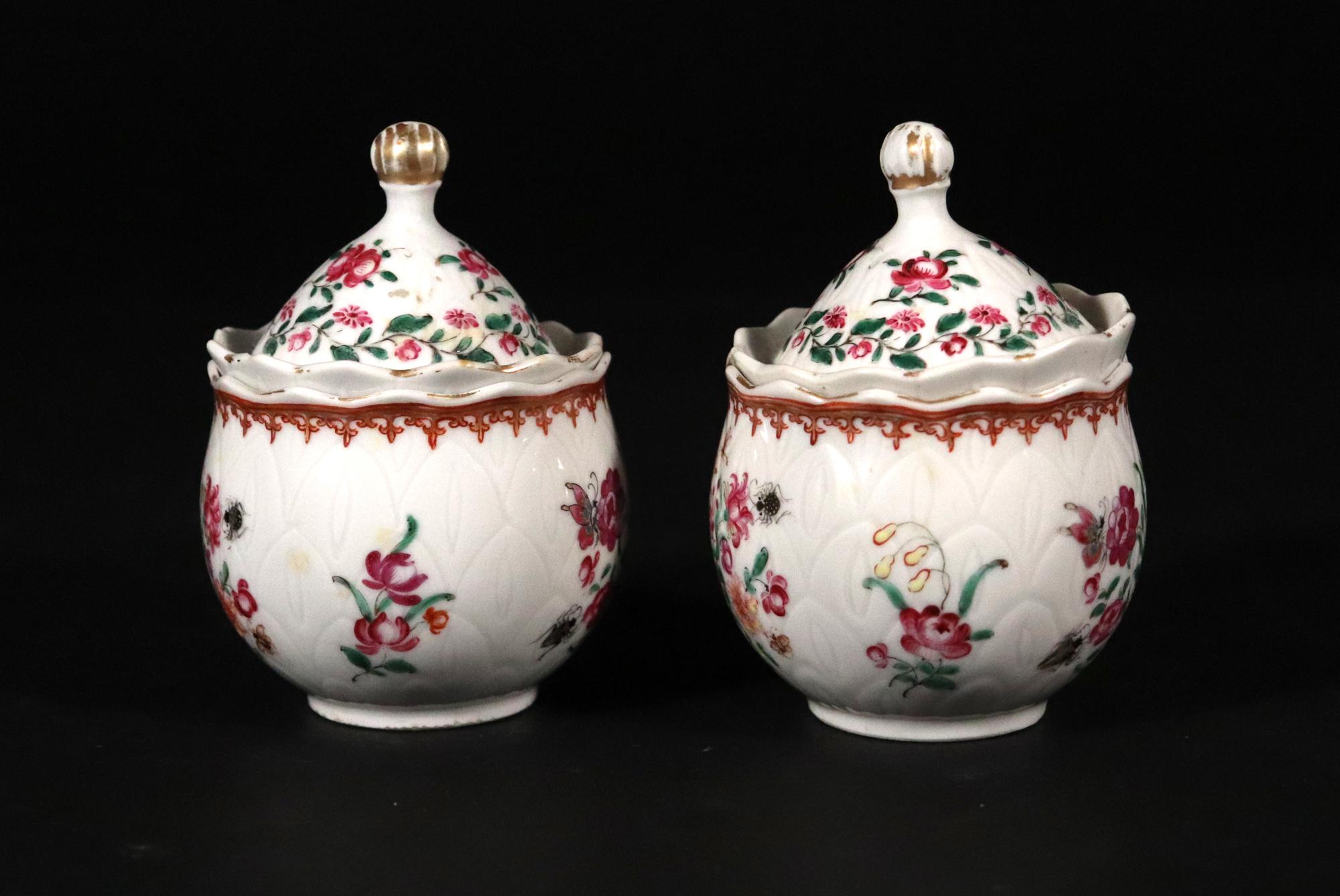 Chinese Export Porcelain Famille Rose Pot De Crème and Covers,
A Pair,
Circa 1775.

The Chinese Export porcelain covered circular pots de creme are decorated in 