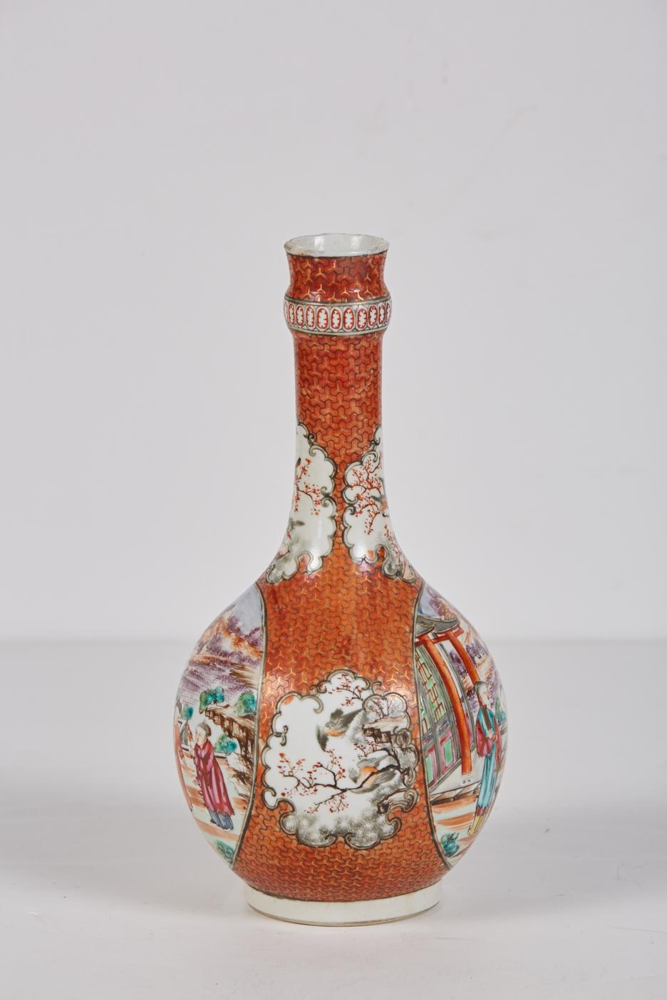 Chinese export porcelain gugglet hand decorated in polychrome Mandarin pattern having gilt accent over iron red background. Large reserves, front and back, present different figural scenes. Smaller intricately shaped reserves between the two larger
