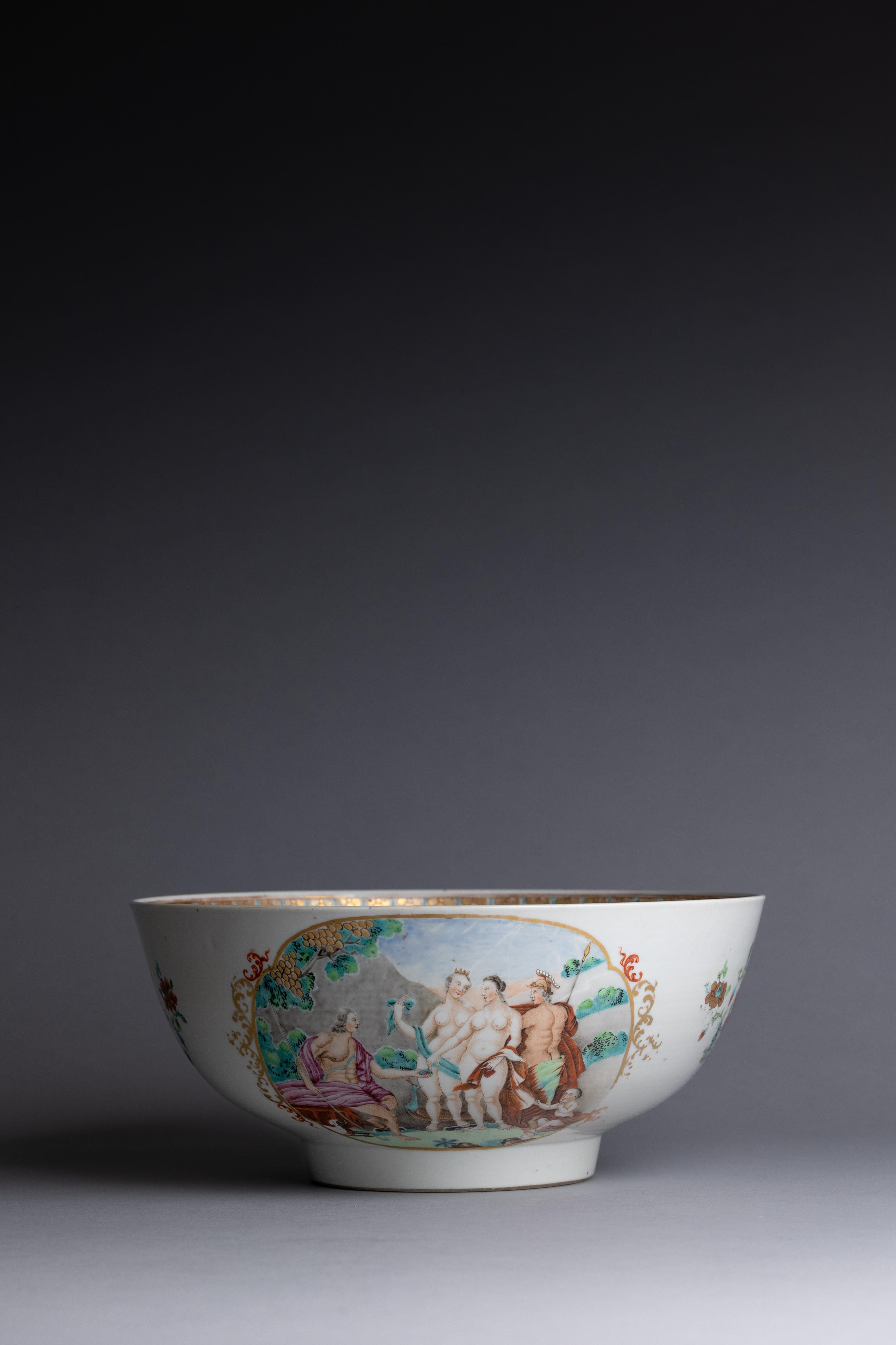 A mid-18th century Chinese export porcelain punch bowl, hand-painted with 