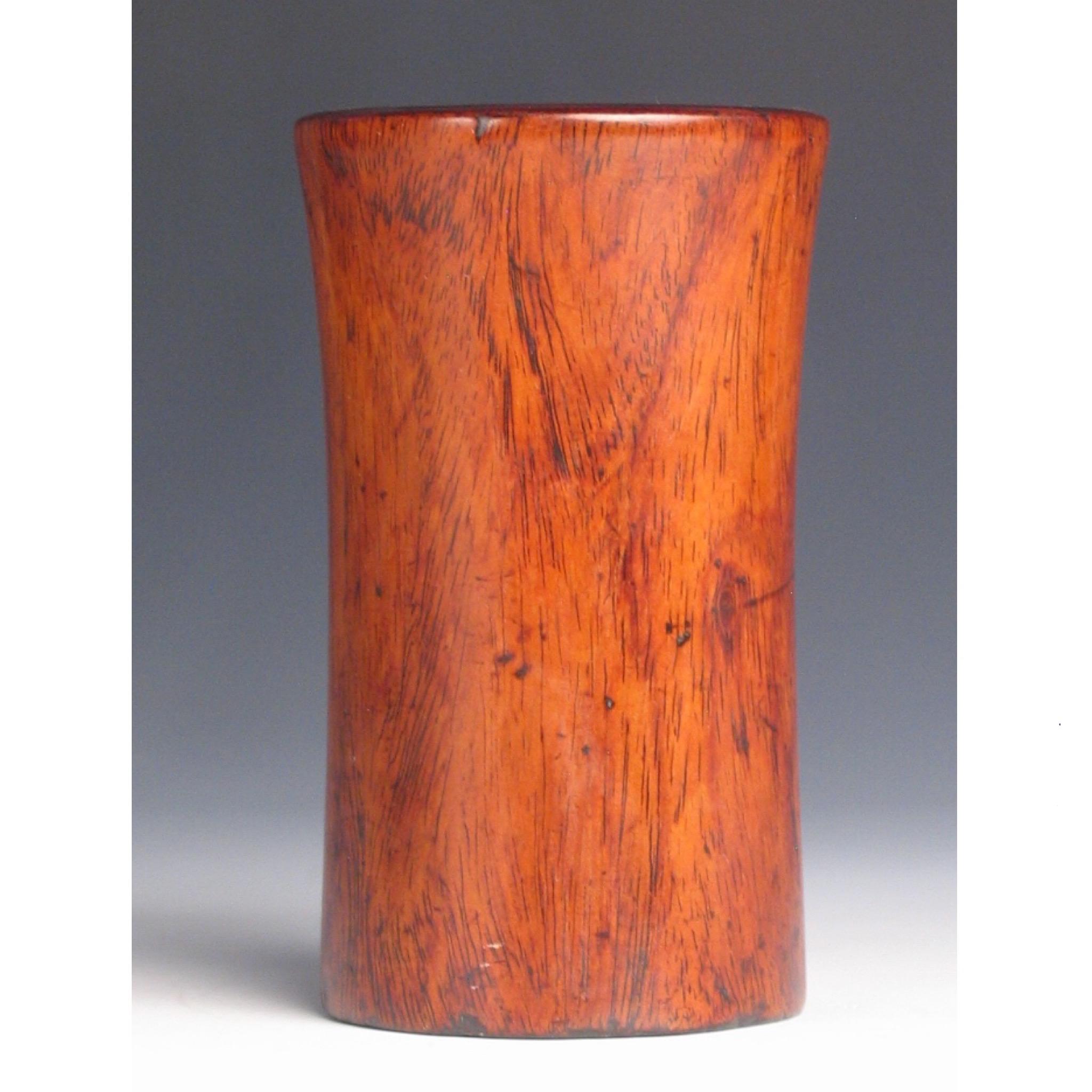 Chinese Huanghuali Brush Pot, Bitong, an elegant simple form, well carved from one honey coloured and nicely figured limb of huanghuali (Dalbergia Odorifera) hardwood, carved as a thin walled cylinder (5/16” thick and 3-1/8”deep) with slight flared