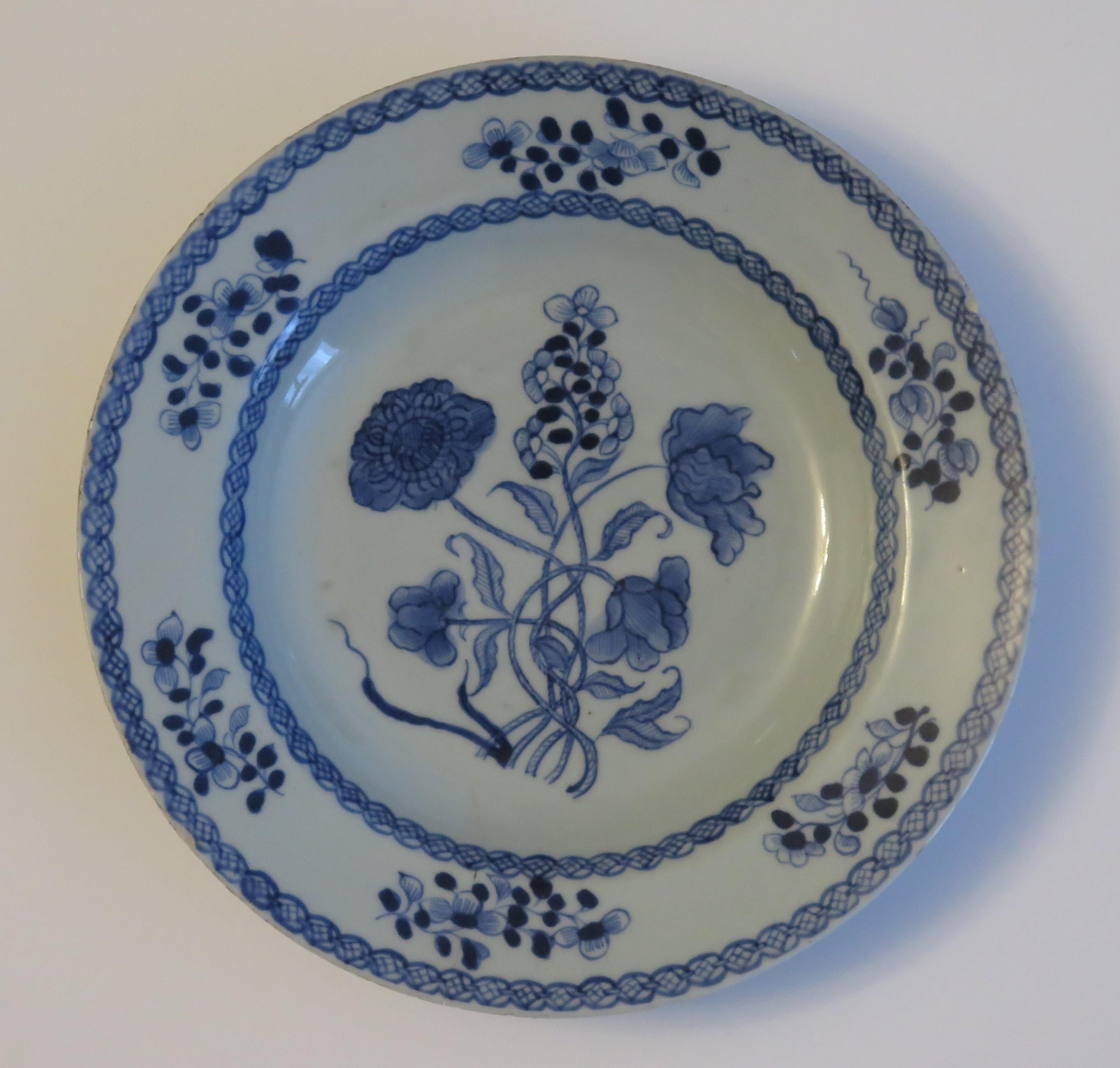 This is a good Chinese porcelain circular deep plate or soup bowl made for the export (Canton) market, during the middle of the 18th century, Qing-Qianlong period.

The plate is well hand decorated with good detail in varying shades of cobalt