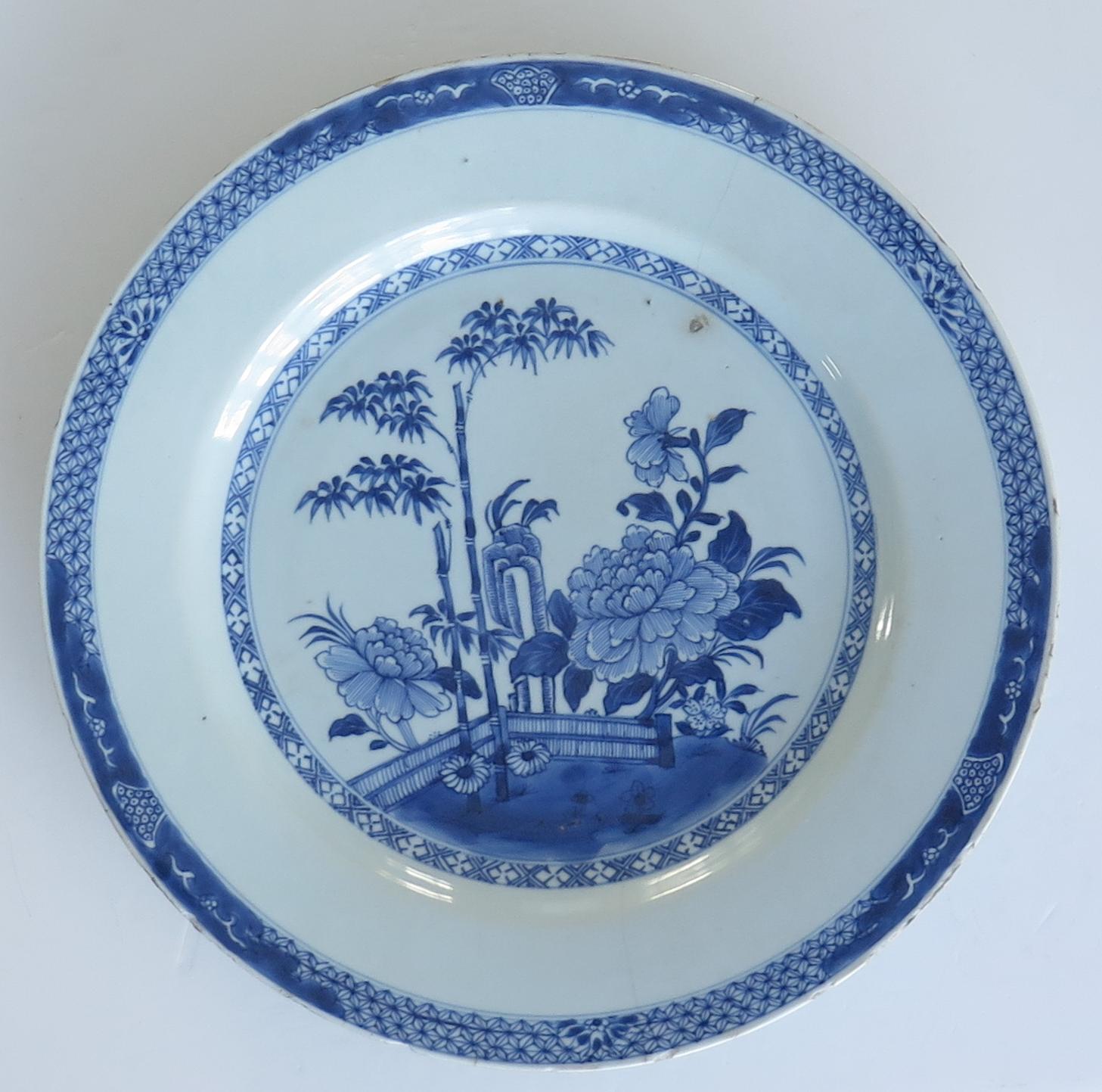 This is a good Chinese porcelain circular Platter or large plate, made for the export (Canton) market, during the middle of the 18th century, Qing-Qianlong period.

The plate is well hand decorated with much detail in varying shades of cobalt