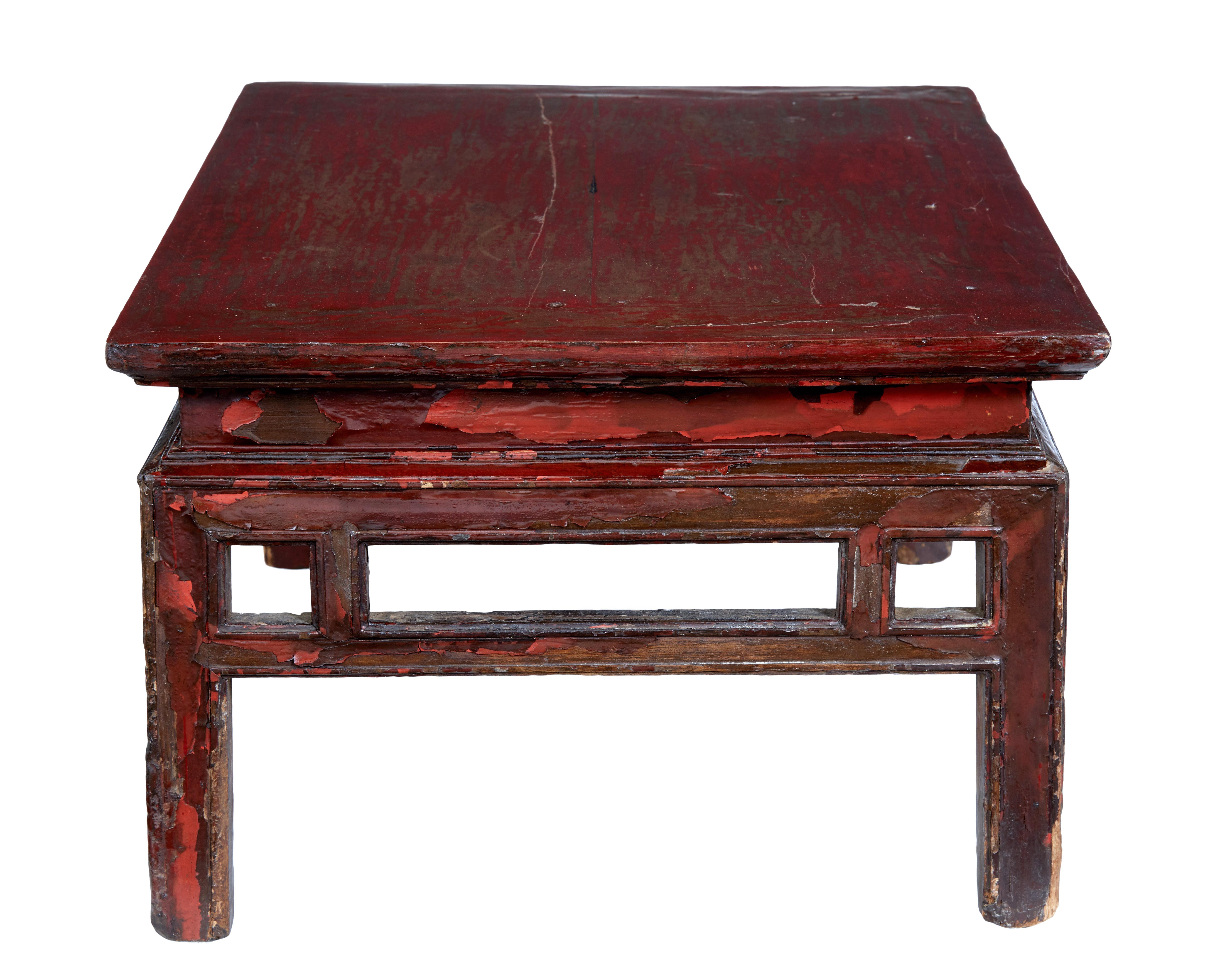 18th century Chinese painted low occasional table, circa 1780.

Here we have a low practical occasional table, richly colored table, with distressed paint showing at least 2 shades, some areas showing complete paint loss. Original condition.