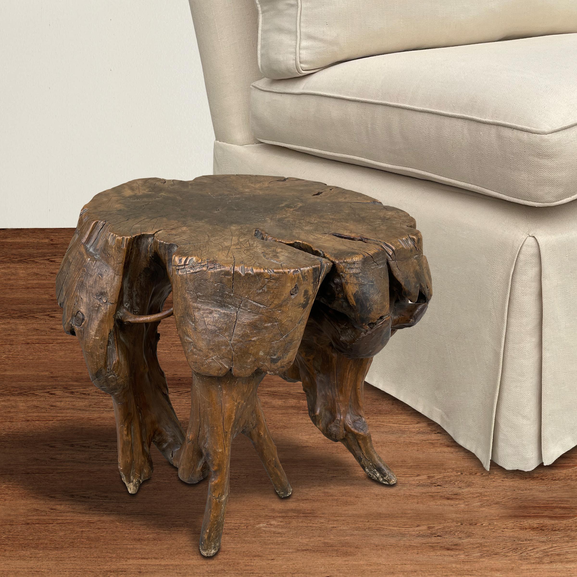 An incredible 18th/19th century Chinese Qing Dynasty Scholar's rootwood stool of wabi-sabi form with naturally formed legs, and a patina only hundreds of years can bestow. Stool also functions as a side table or drinks table next to your favorite