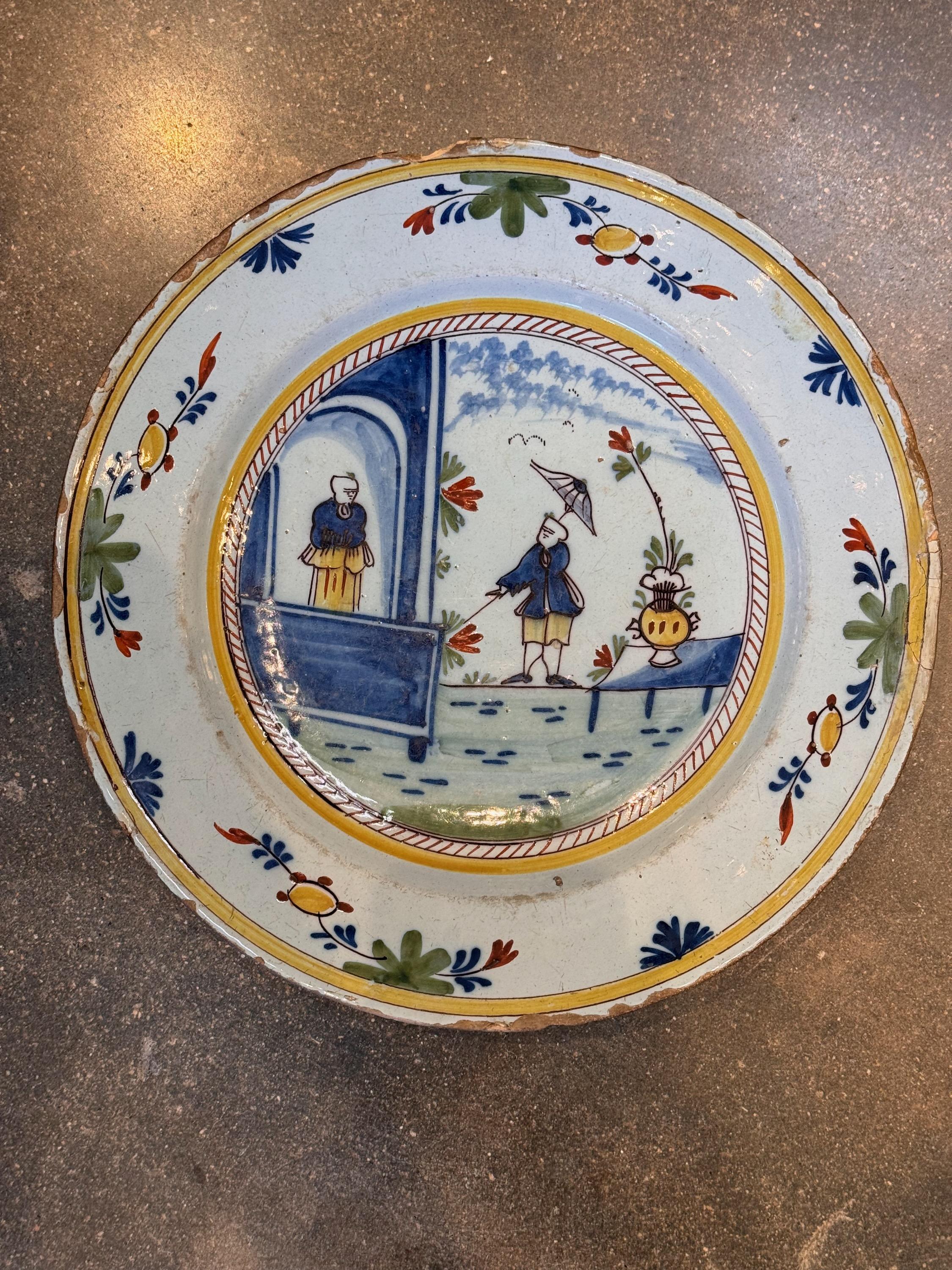This polychrome Delft Charger is so pretty. Even with its imperfections.