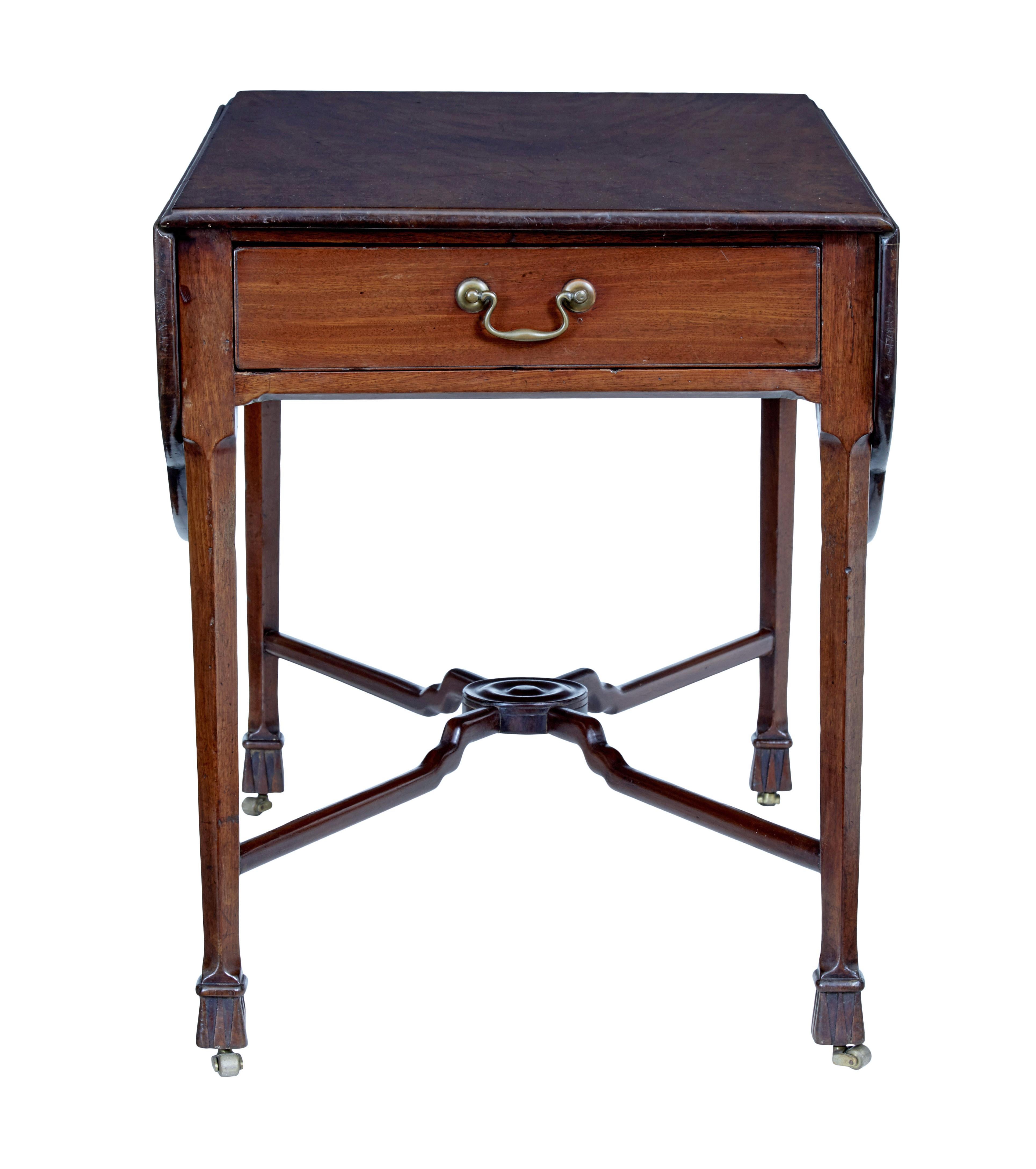 18th century Chippendale mahogany pembroke table, circa 1770.

Here present a Chippendale period pembroke table made in the finest mahogany.

Shaped drop leaves open to for a flame mahogany top. Drawer fitted with later brass swan neck handle on