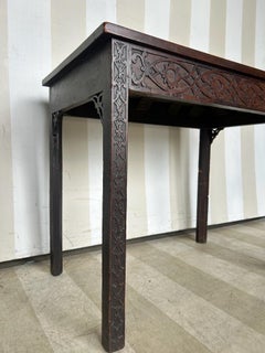 18th century Chippendale period table with carved blind feet apron