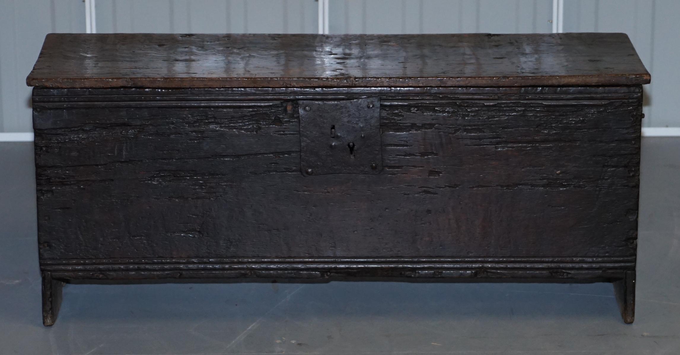 We are delighted to offer for sale this absolutely stunning very rare original 18th century oak coffer, circa 1720

A sublime looking piece, traditionally made as a six plank chest, the lock and handles are thick hand hammered iron and totally