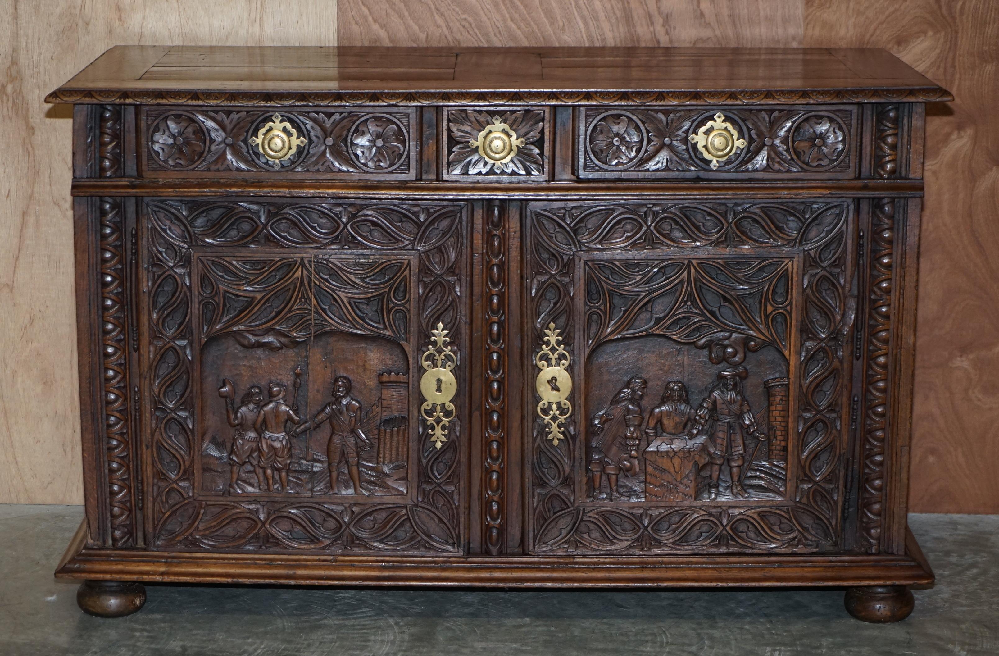 We are delighted to offer for sale this stunning 18th century circa 1740 hand carved continental European sideboard with military carved panels

A good looking well made and decorative piece. This is a rare survivor and looks absolutely stunning