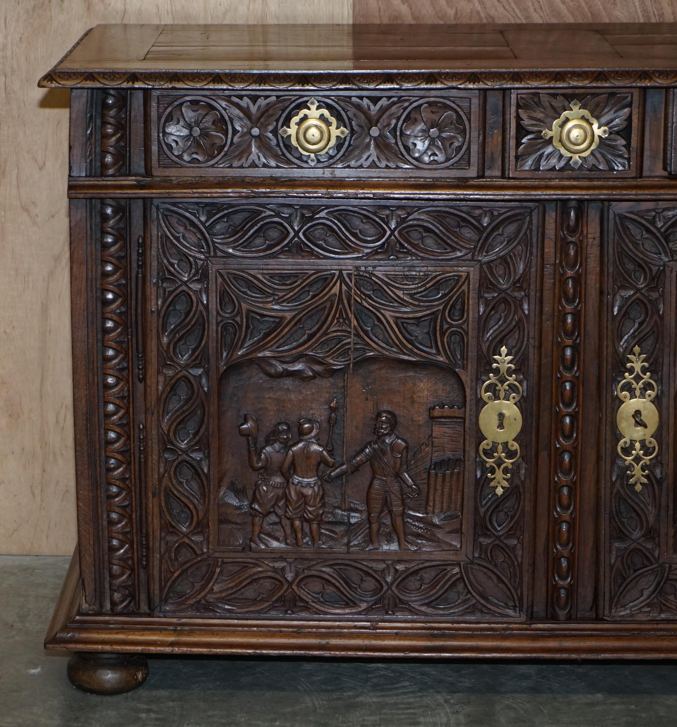 George II 18th Century Circa 1740 Hand Carved Oak Sideboard with Military Campaign Scenes