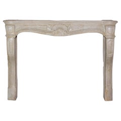 18th Century Classic French Regency Period Light Limestone Fireplace Mantle