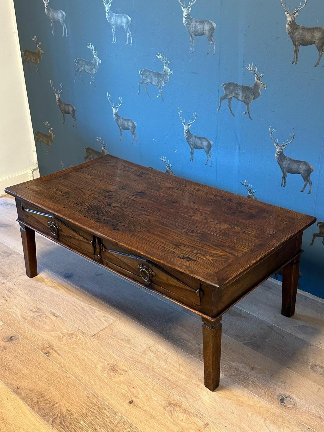 Beautiful antique oak coffee table with 2 drawers. In perfect condition. Beautiful weathered table.
Origin: France
Wood type: Oak
Period: 18th century
Size: 124cm x 64cm x h.47cm