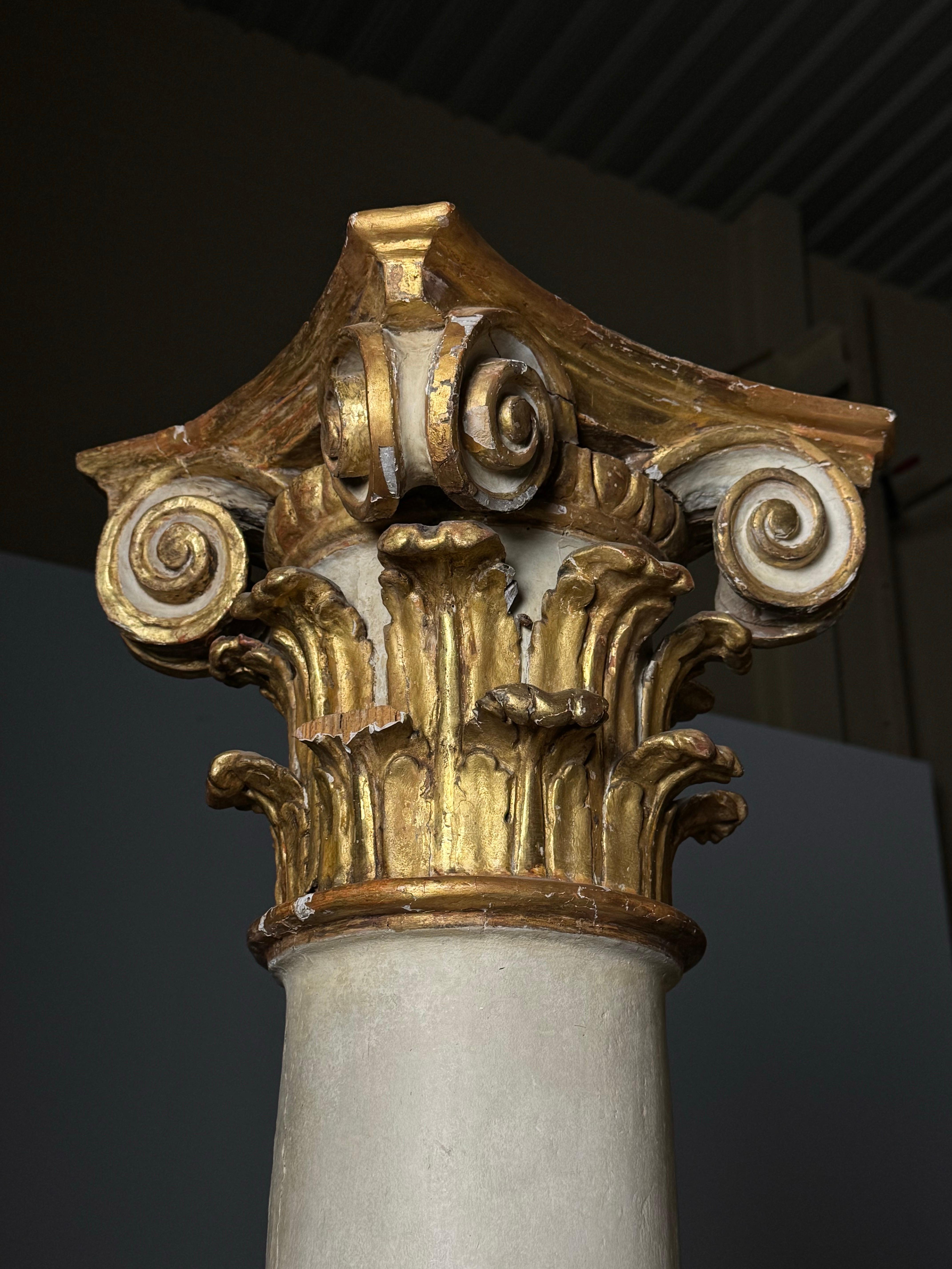 Pair of large 18th-century columns with hand-carved gilt capitals.

From private Spanish collection of Rita Espírito Santo. Auctioned at Christies in England in 2021.

Some missing pieces here and there / see photos

Dimensions: 219H x 34W x 26D