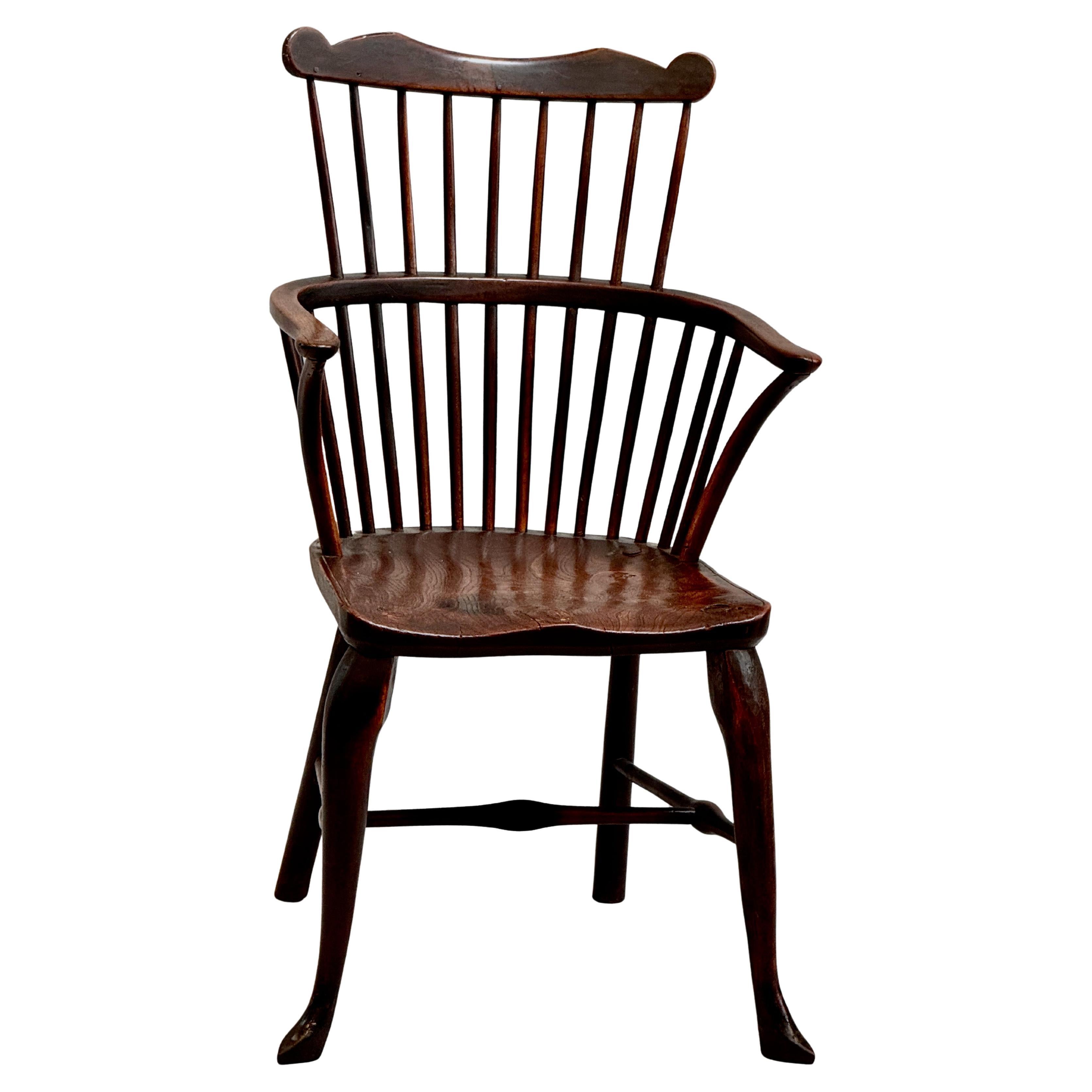 Típica de las sillas Windsor Fabricada en los alrededores de High Wycombe, en Buckinghamshire, a finales del siglo XVIII. De fresno y cerezo, con asiento de una sola pieza de 