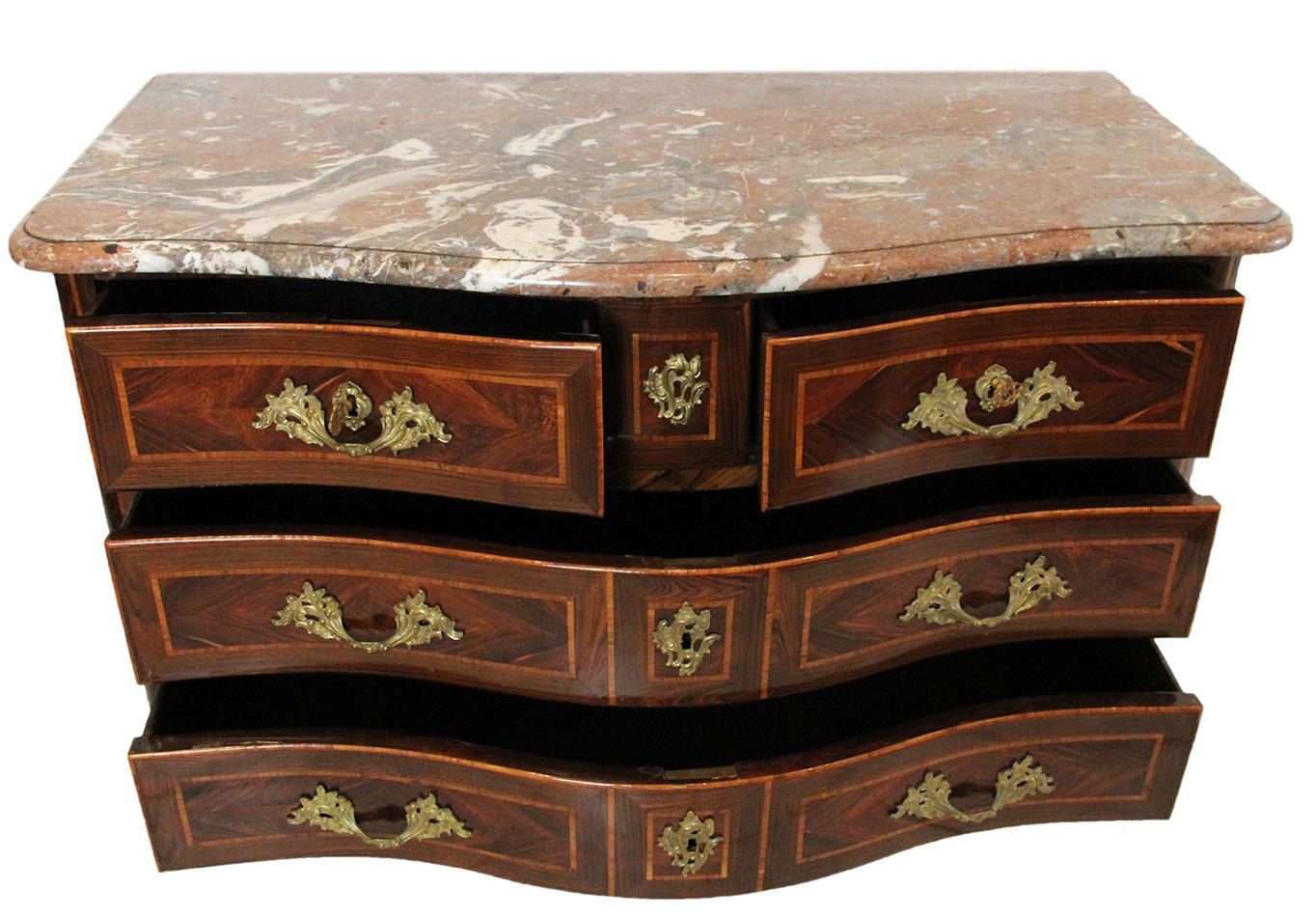 18th century commode or chest of drawers Stamped Jean Charles ELLAUME with veined marble top
Beautiful chest of drawers with a curved front opening to 4 drawers on 3 rows and bearing a double stamp.
Two stamps of Jean-Charles ELLAUME, received
