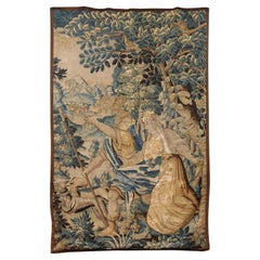 Tapisserie d'Aubusson continentale du XVIIIe siècle avec personnages et chiens dans une scène de forêt