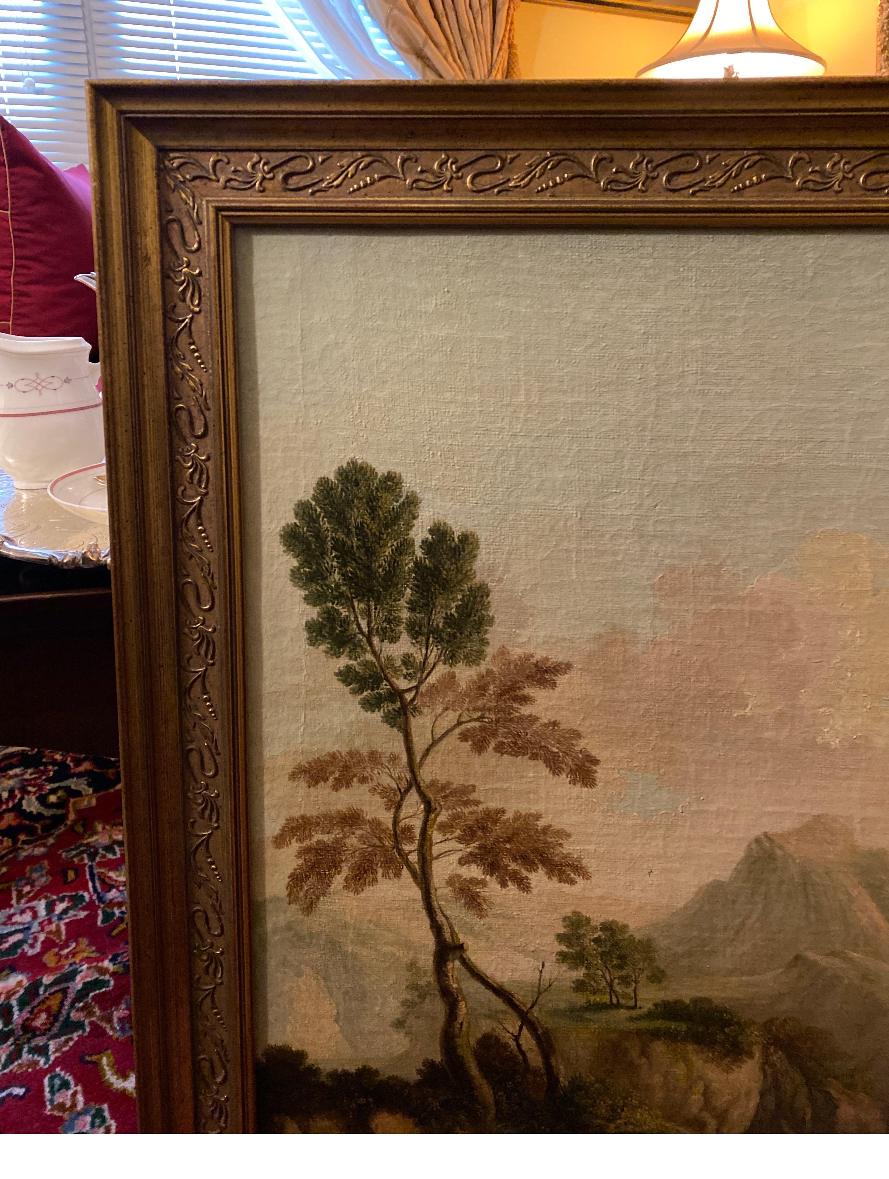 Un óleo original sobre lienzo, estilo Viejo Maestro, en marco posterior de madera dorada. Cuadro con un fondo bellamente pintado de una montaña y nubes con árboles en primer plano. Las figuras hacia el fondo de Abraham expulsando a los infieles.