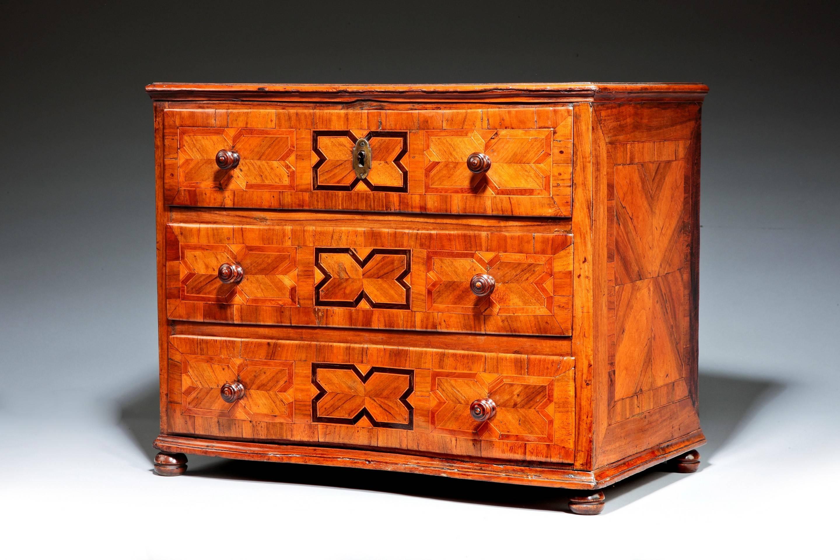 Unusual 18th century walnut shaped table chest of drawers.