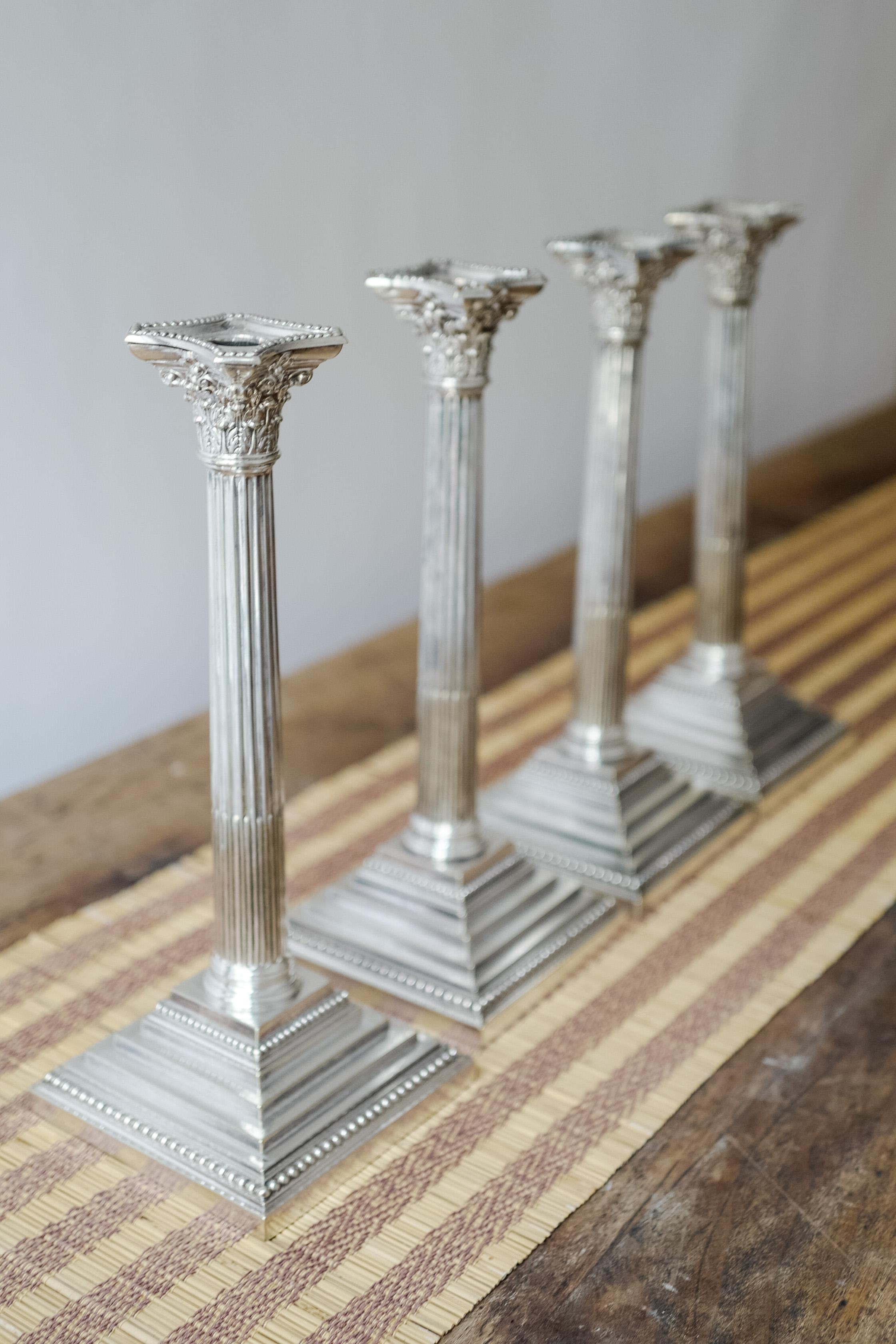 British Set of Four 18th Century Sterling Silver Corinthian Candlesticks For Sale