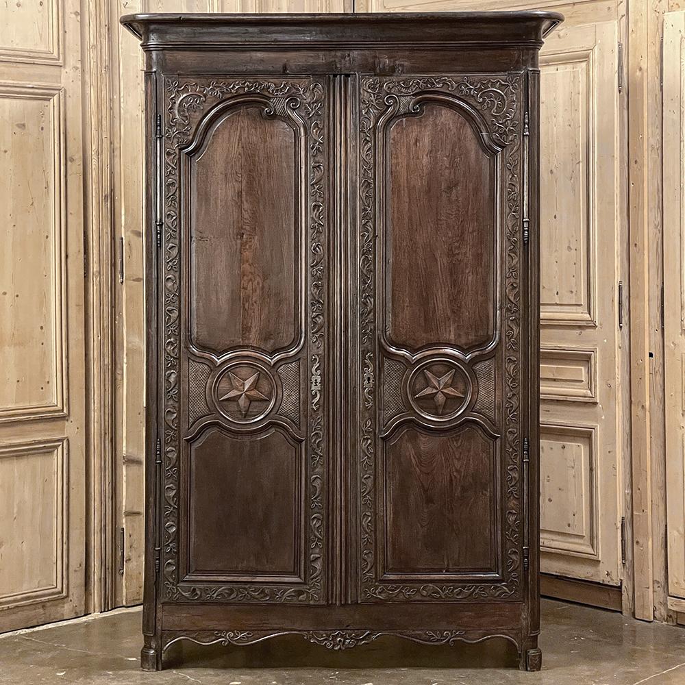 Hand-Carved 18th Century Country French Armoire with Carved Lone Stars For Sale