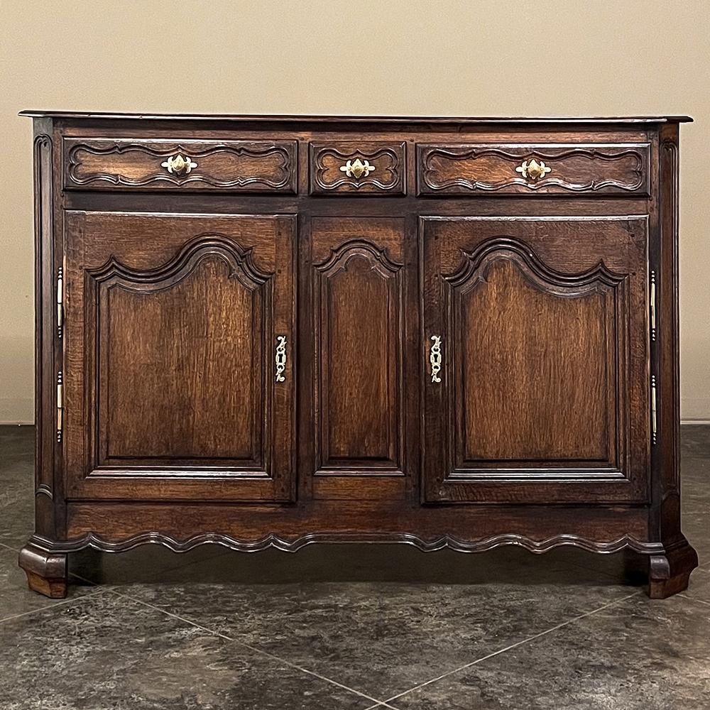18th Century Country French Buffet is a classic design that has remained popular for centuries! Using dense, old-growth quarter-sawn oak, the artisans who created it utilized time-honored techniques handed down from generation to generation,