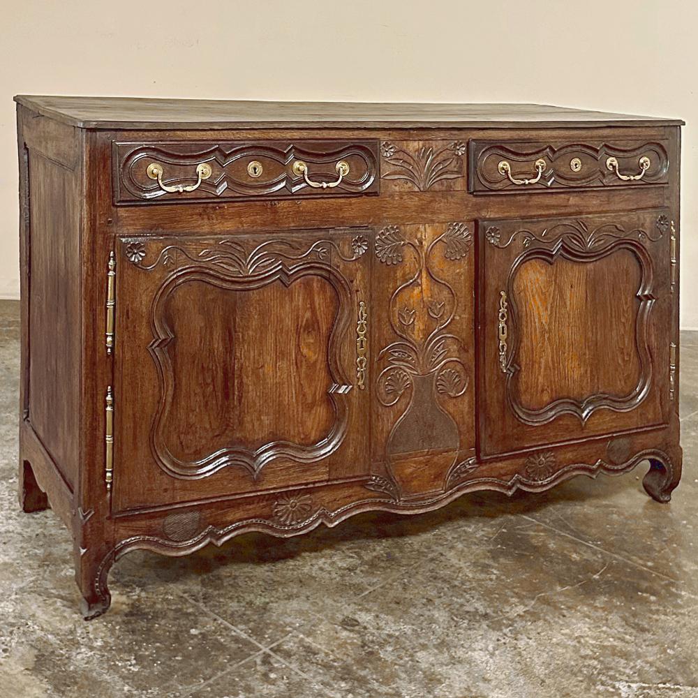 18th Century Country French Buffet from Lower Brittany is a classic example of the charming furniture produced in the region completely by hand during this period.  Utilizing techniques handed down from generation to generation, it features pegged