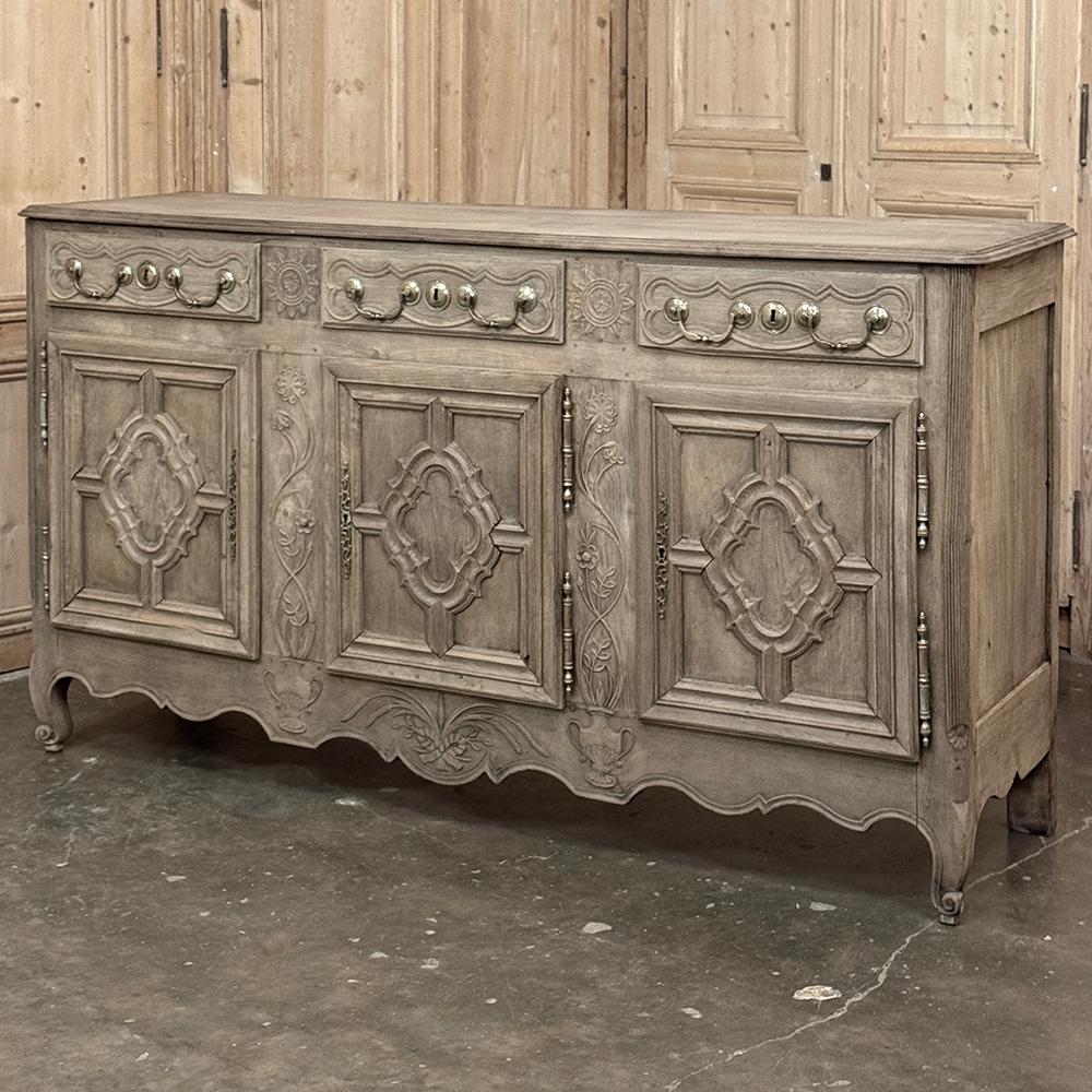 18th Century Country French Louis XIII Buffet in Stripped Oak is a masterpiece of craftsmanship where the artisans used centuries-old techniques and tools almost as old to create works of the cabinetmaker's art designed to last for generation after