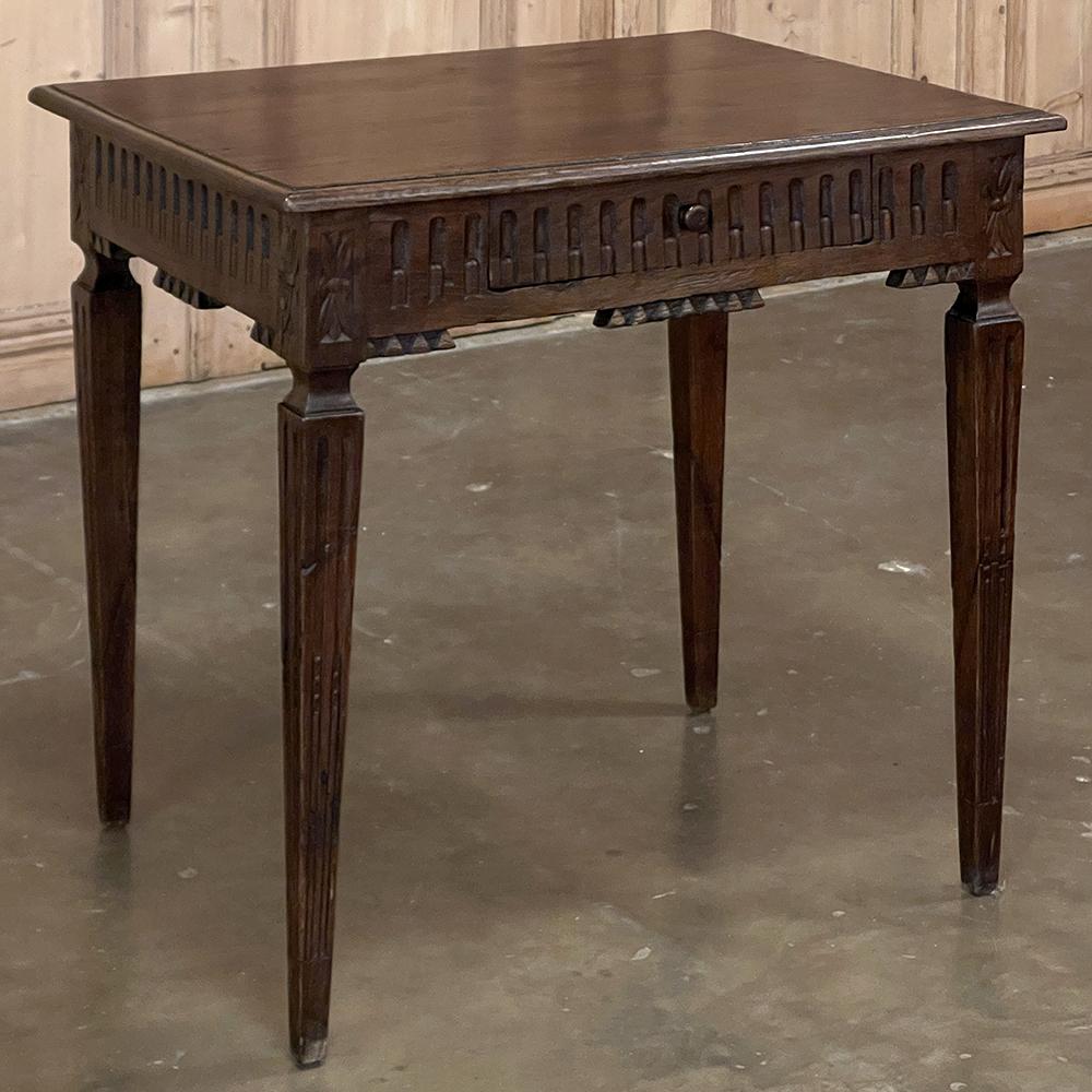 18th century Country French Louis XVI Period end table is a classic and timeless design not only because it represents the revival of ancient Greek and Roman architecture, but in this case the table is finished and carved on all four sides, making