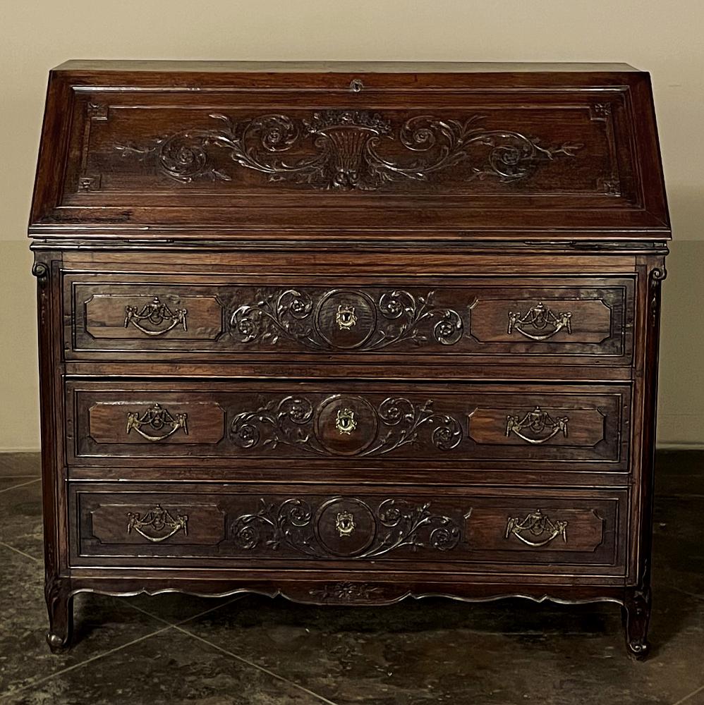 18th Century Country French neoclassical secretary is a splendid example of the genre, dating to the reign of Louis XVI himself! The period saw the rebirth of classical architecture and ornamentation, exemplified in this design, with tailored