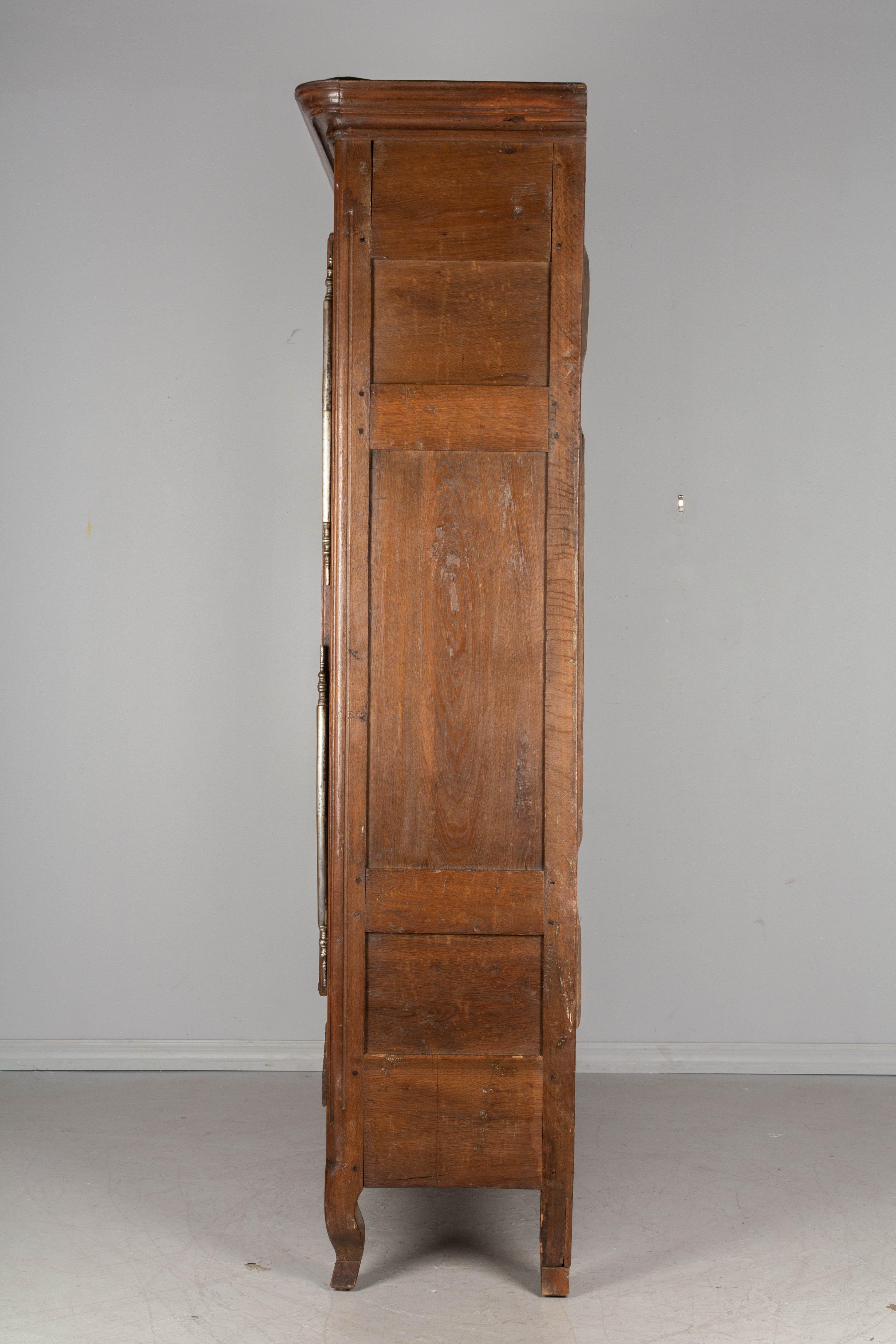 Iron 18th Century Country French Oak Armoire or Bookcase For Sale