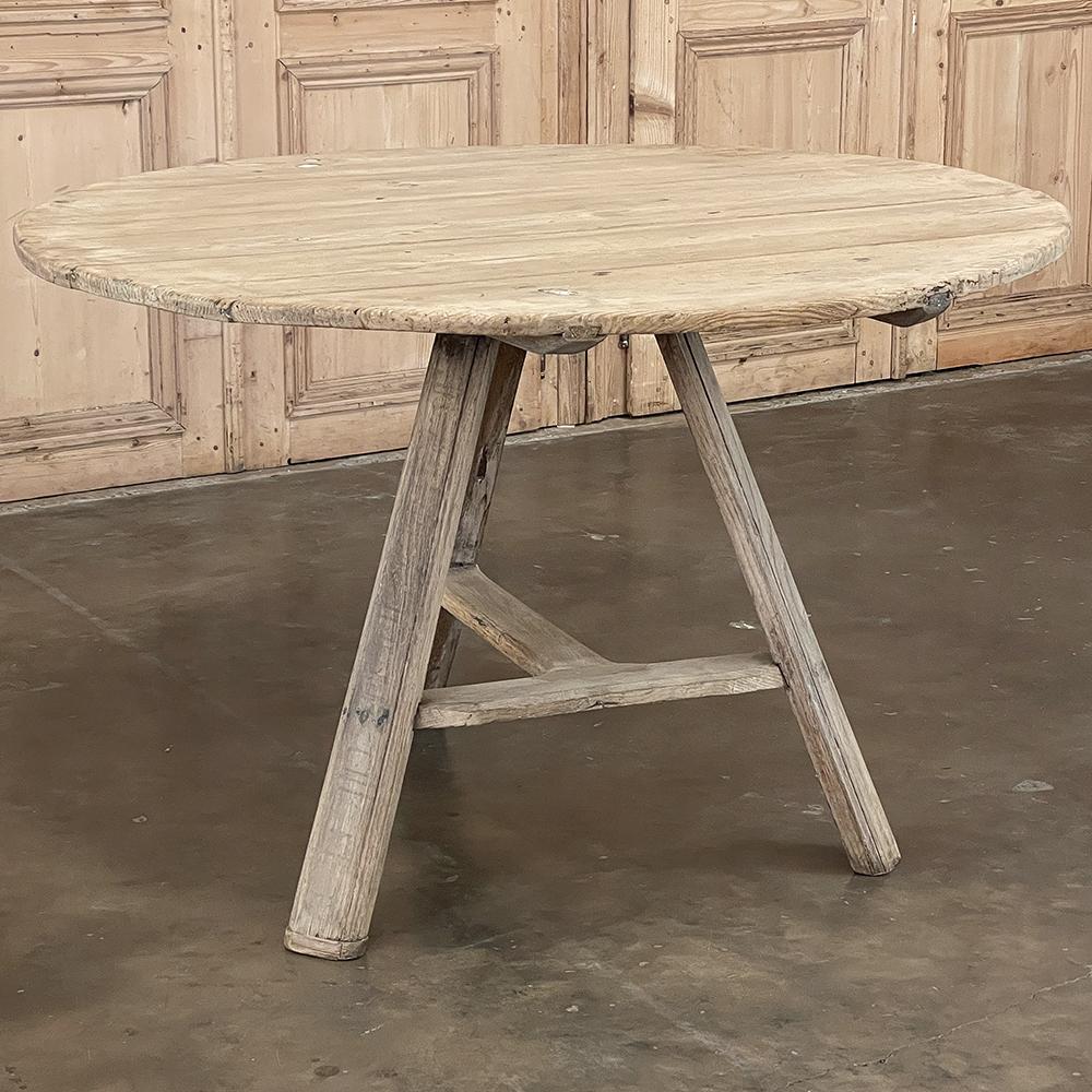 18th century Country French Tilt-Top Center Table is an ingenious solution in the form of a space-efficient design that provides a generous table top when needed, but tucks out of the way to create more room. Popularized in wine cellars known for