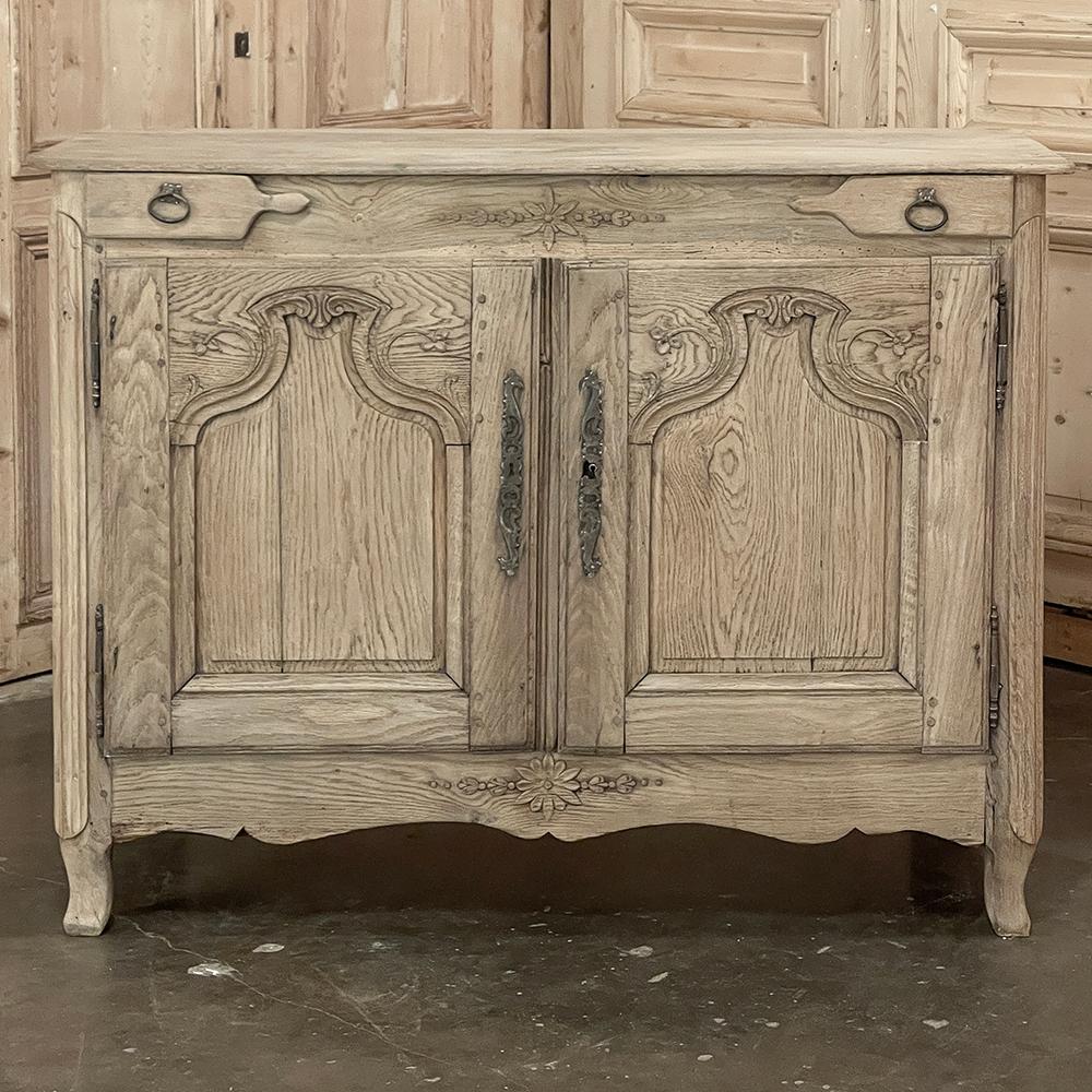 18th Century Country French Vintner's Buffet in Stripped Oak is an unusual design, created for a prosperous wine producer during the waning years of the century out of solid, indigenous old-growth white oak, the same wood used by the barrel cooper