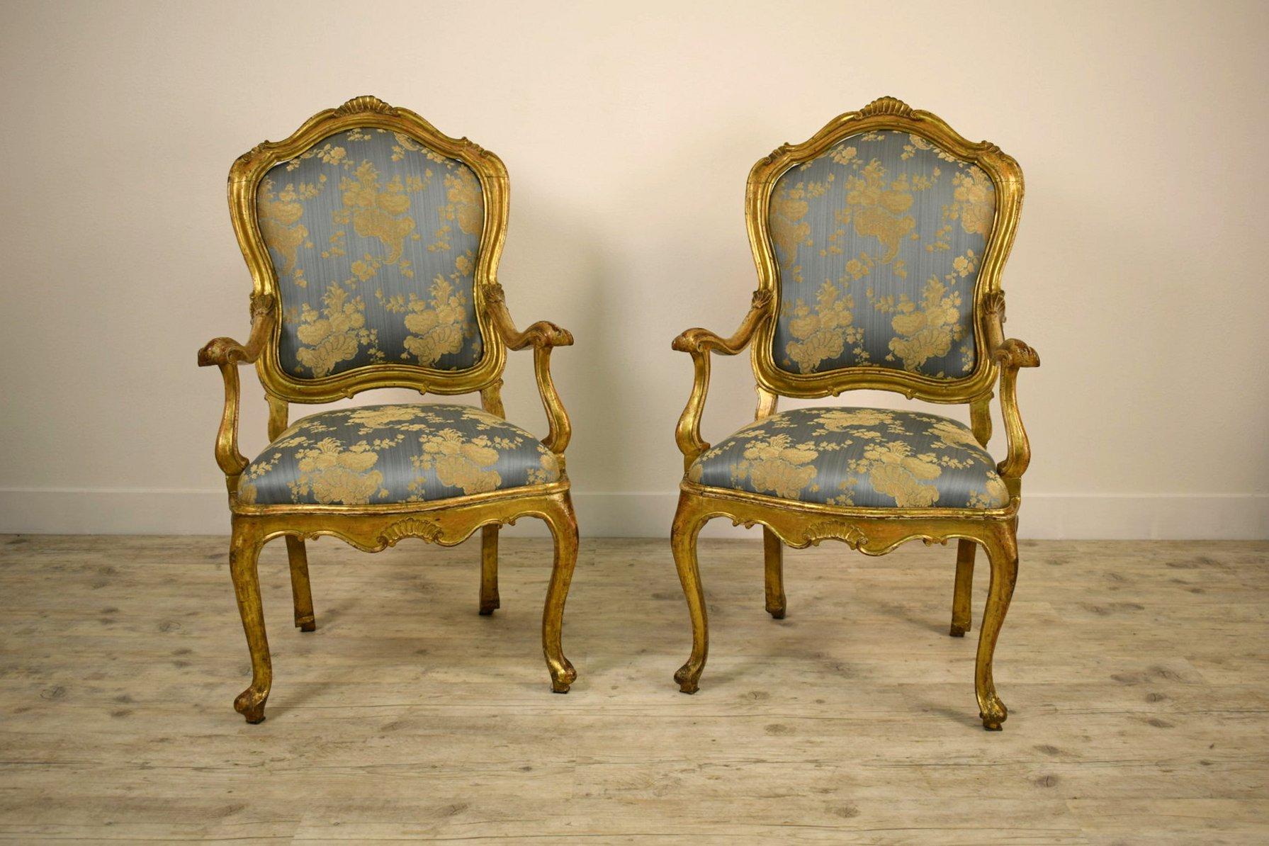 18th century couple of Italian giltwood armchairs

This refined and important pair of armchairs was made around the middle of the 18th century in Venice, Italy, in carved giltwood and reflects the typical stylistic dictates of Venetian