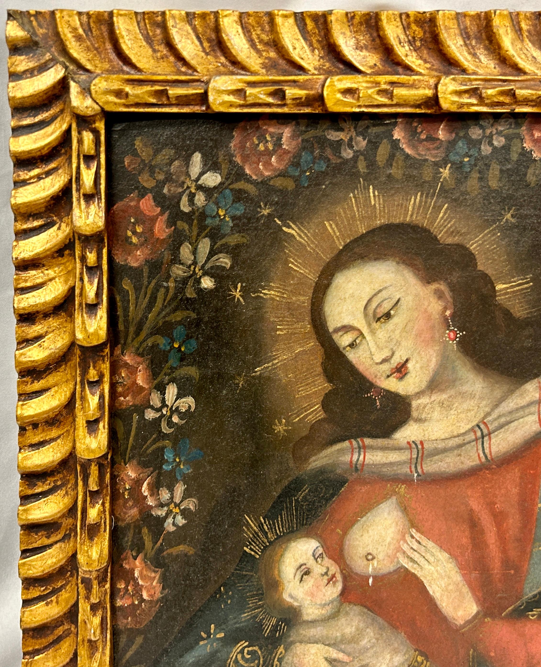 Vintage Cuzco School oil on canvas mounted on board, Madonna nursing child. Depiction of a Colonial Style Madonna with child in her right arm. Carved gilt wood frame. Measurements include frame.
The unidentified artist who painted this was part of a