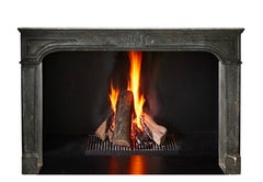 18th Century Dark Stone Fireplace Surround From French Chateau