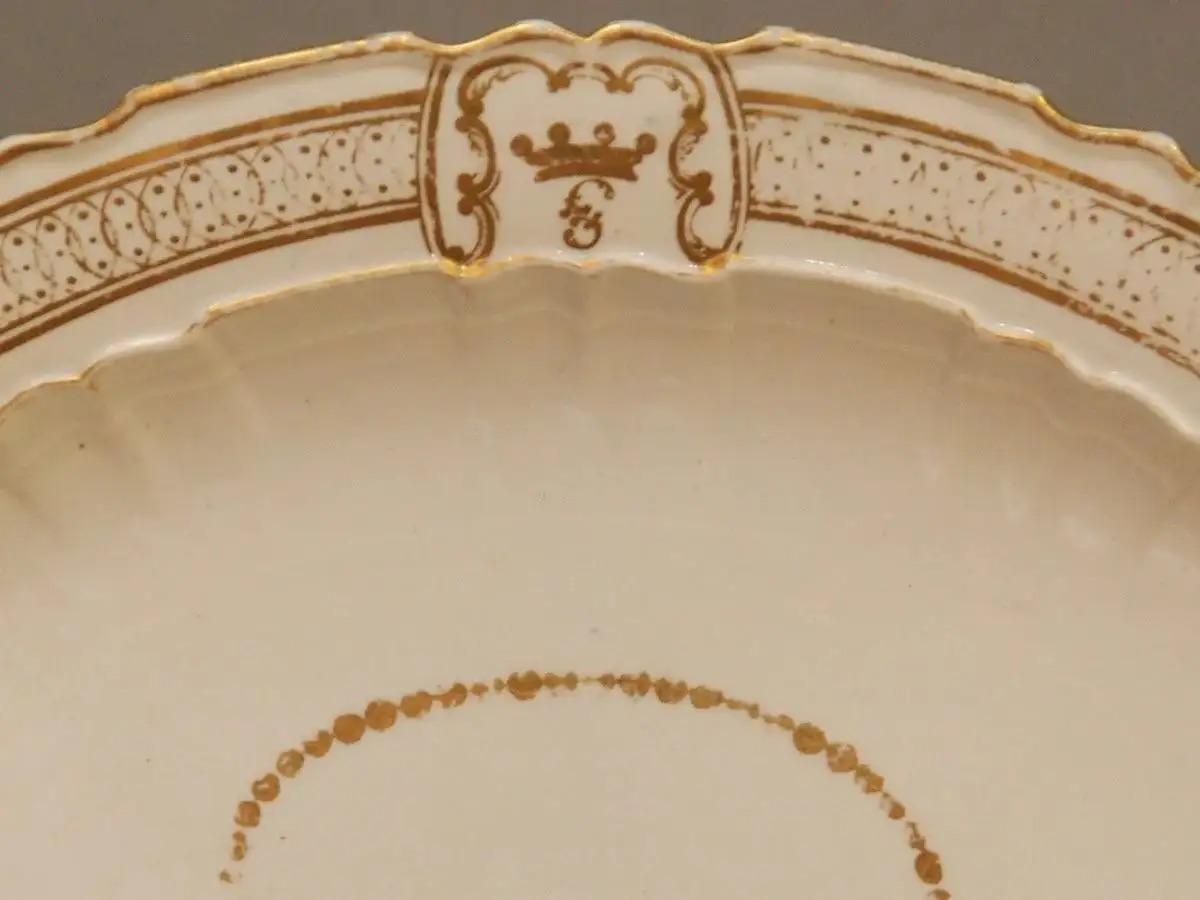 A rare 18th century Davenport platter, gilded with monogram, impress mark 