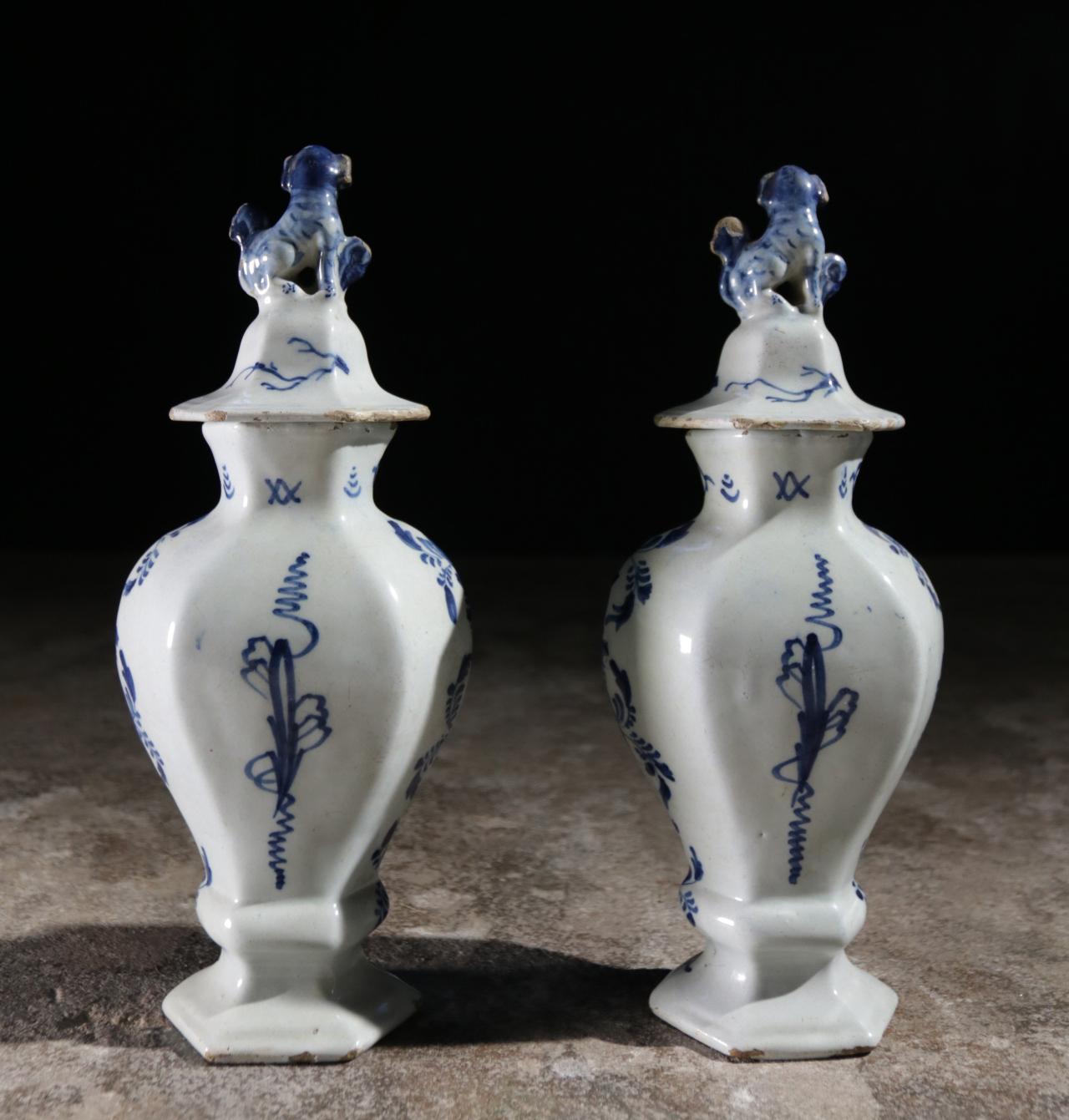 Two 18th century delft earthenware vases signed VB (Pieter van den Briel 't Fortuyn, 1753-1759)
In original condition, no restorations as you can see on the photo's.

VB mark 
: Van den Briel

later used by: widow Van den Briel-Elling

Pieter van
